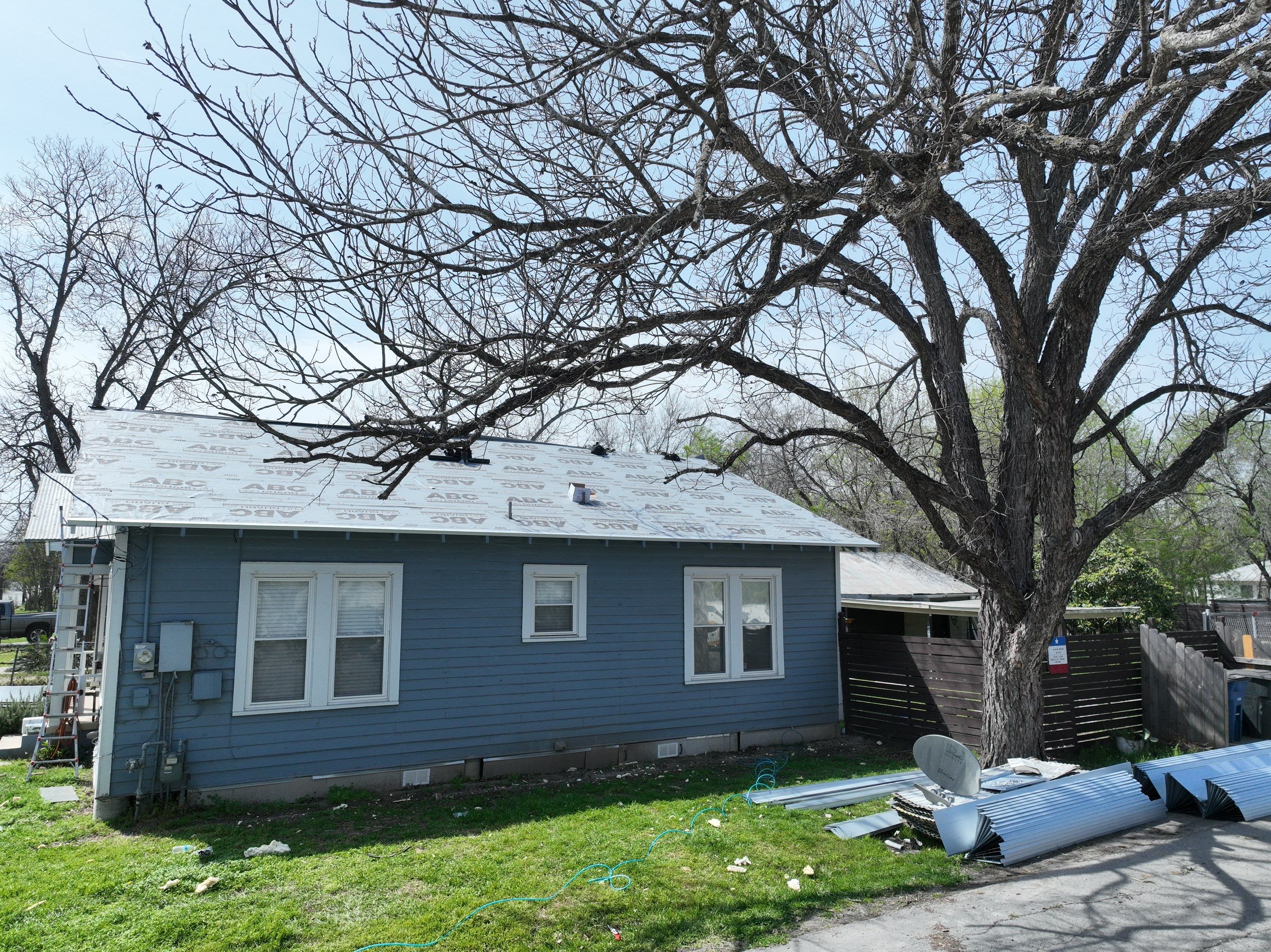 Residential Metal Roof Installation using McElroy Metal by Premier Roofing and Contracting