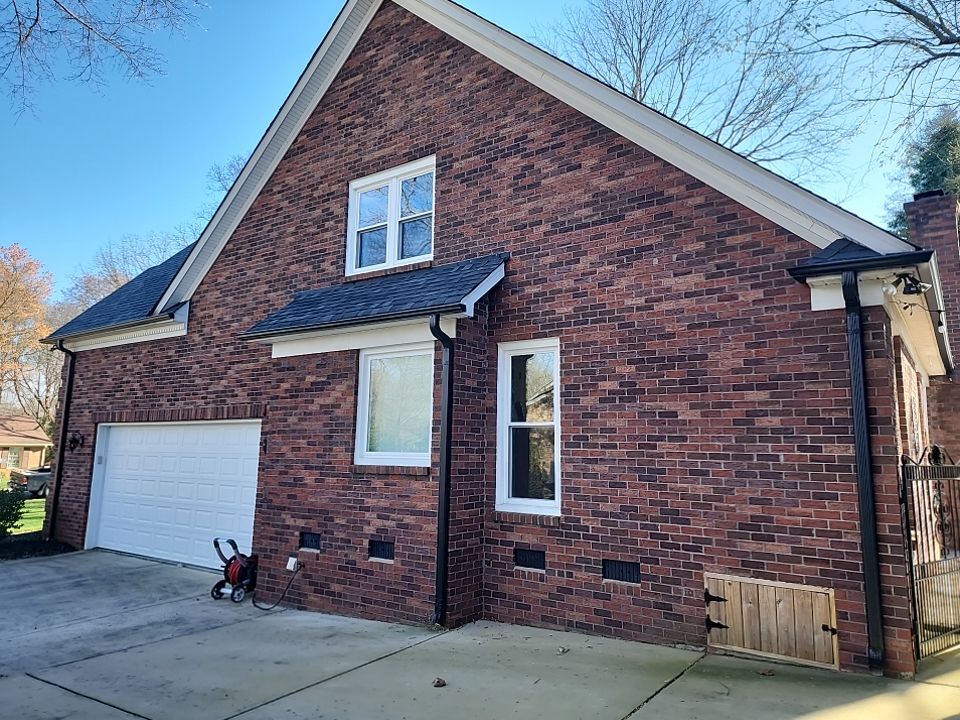 House Wash using cleaner by Power Wash Masters LLC