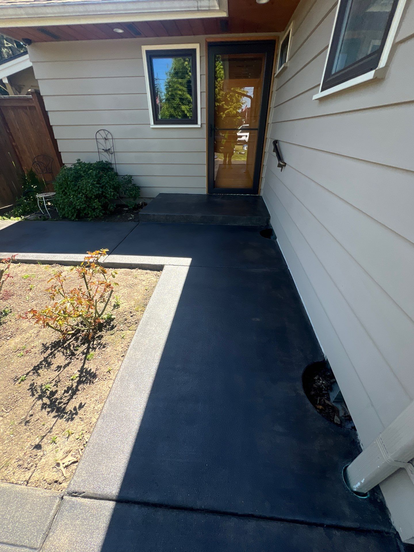 Colored Concrete Driveway Repair with Sealer| Everett    by Jireh Asphalt & Concrete Inc 