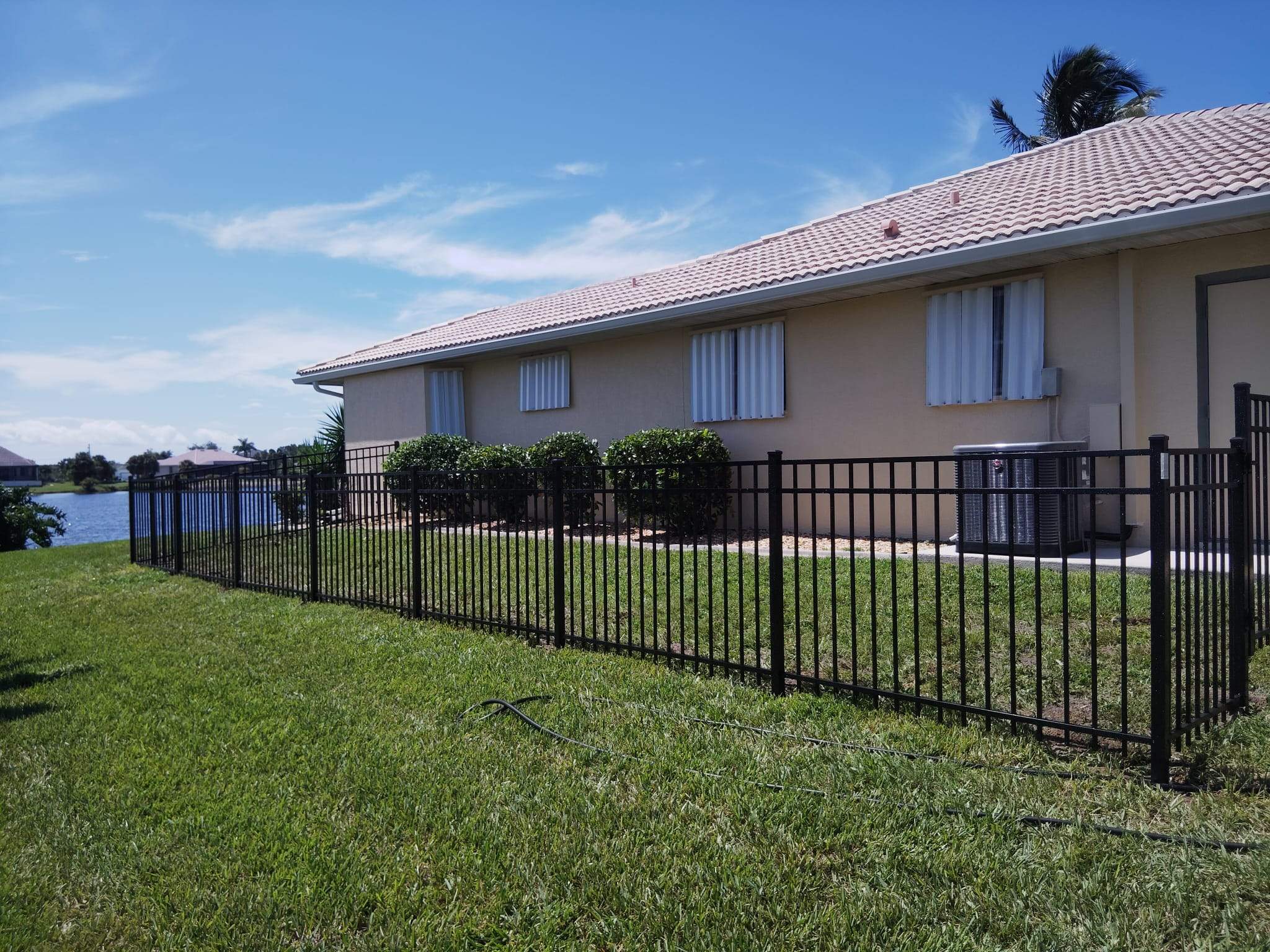 Black Aluminum Picket Fence Installation in Punta Gorda by True Fence LLC