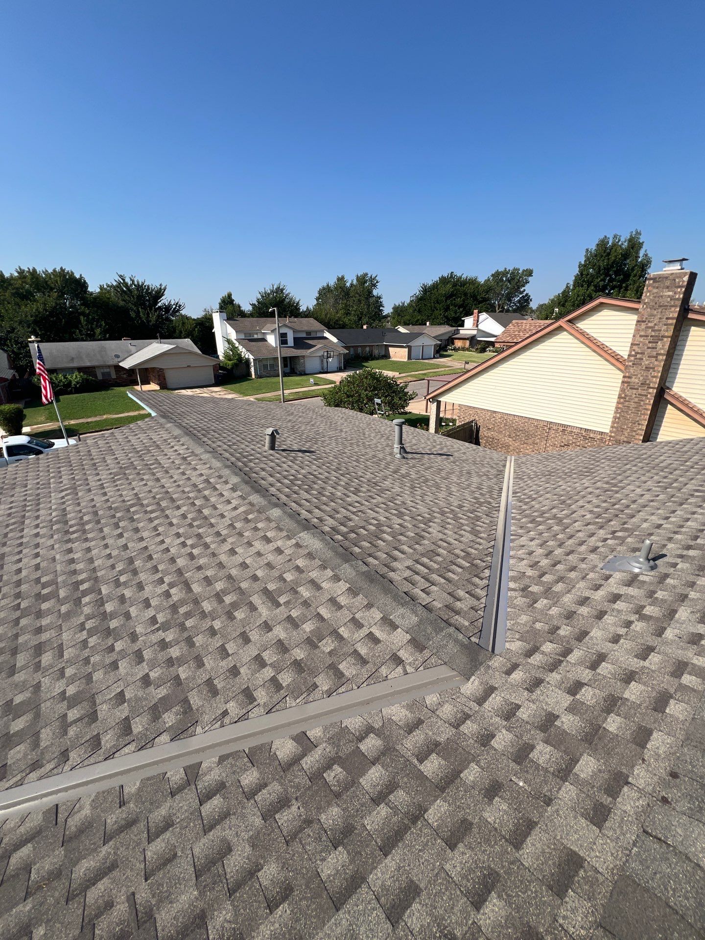 Roof Replacement and Gutter Installation in Oklahoma City, OK by McCann's Roofing and Construction