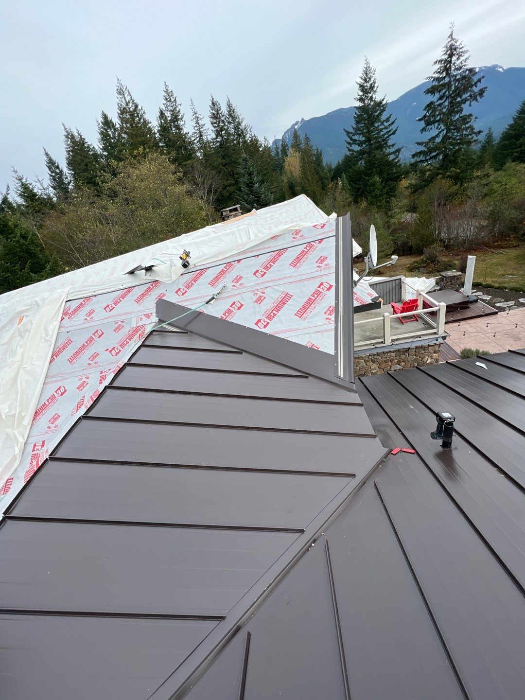 North Bend Roof Replacement using Standing Seam Metal - Dark Bronze by RoofSmart