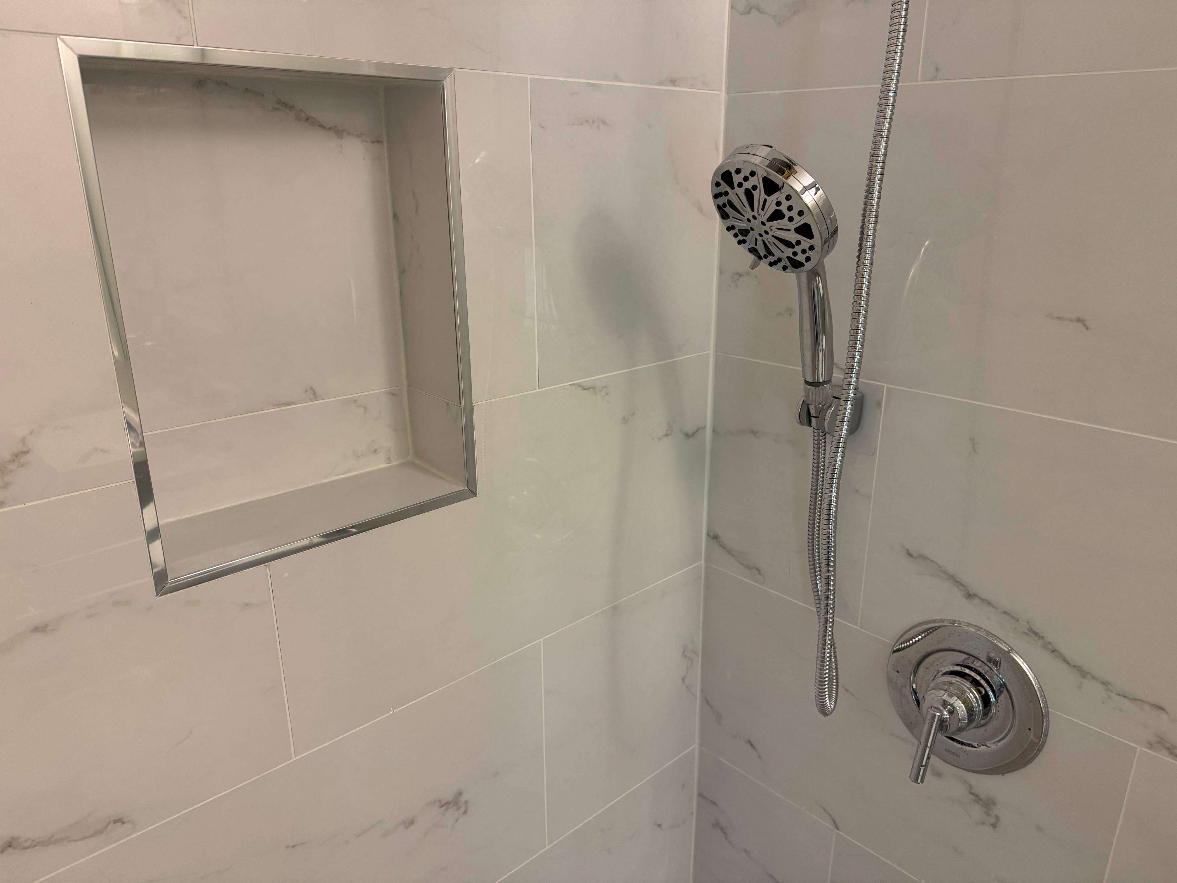 Tub to walk-in shower conversion by Prudencio