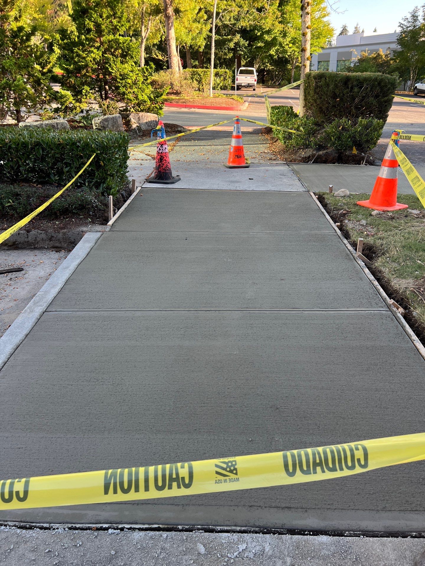 Kidder Matthews | Parking Lot Sealcoating & Striping with Concrete Curb & Patch Repairs  by Jireh Asphalt & Concrete Inc 