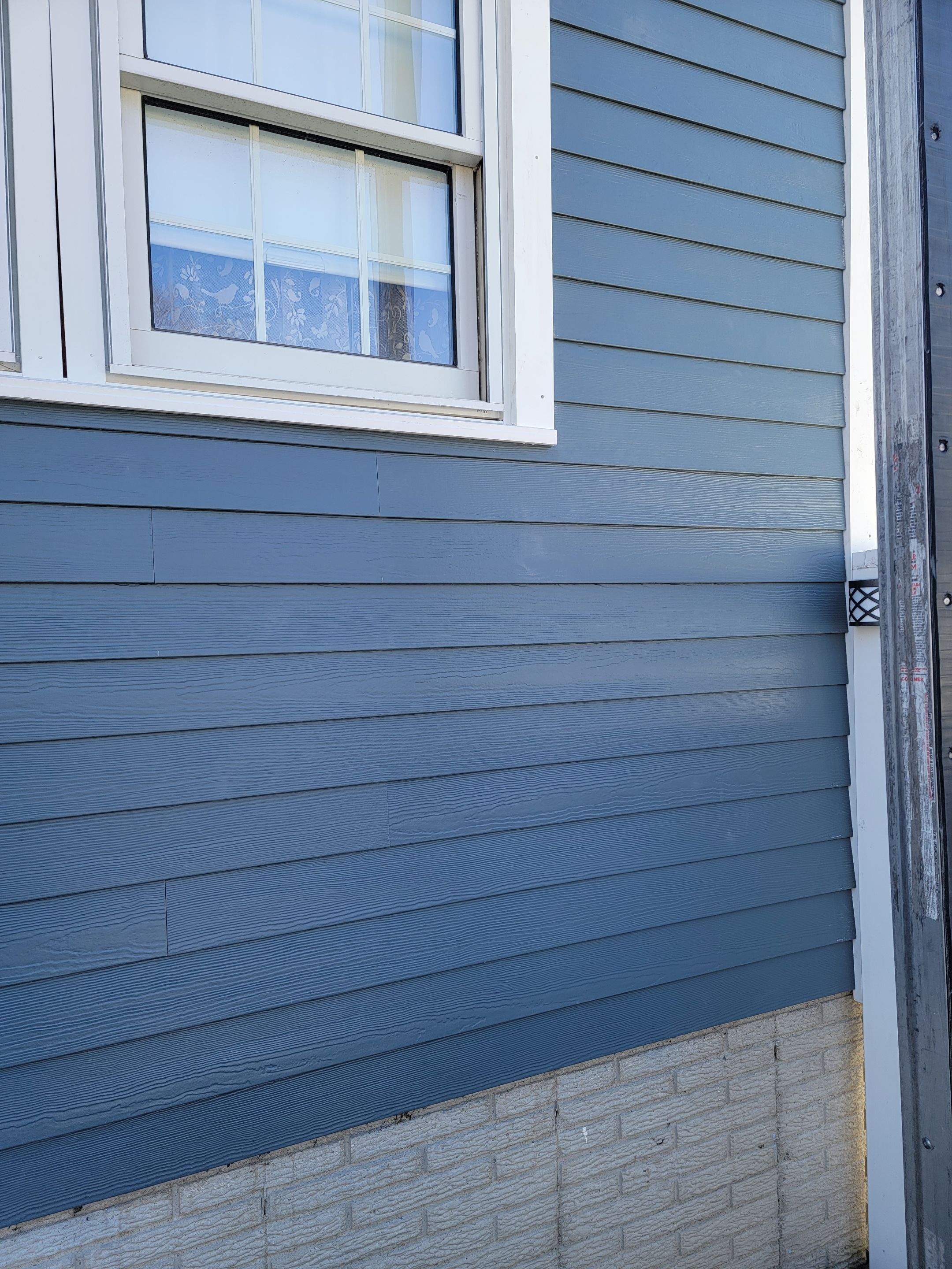 Siding Installation using James Hardie by UBrothers Construction