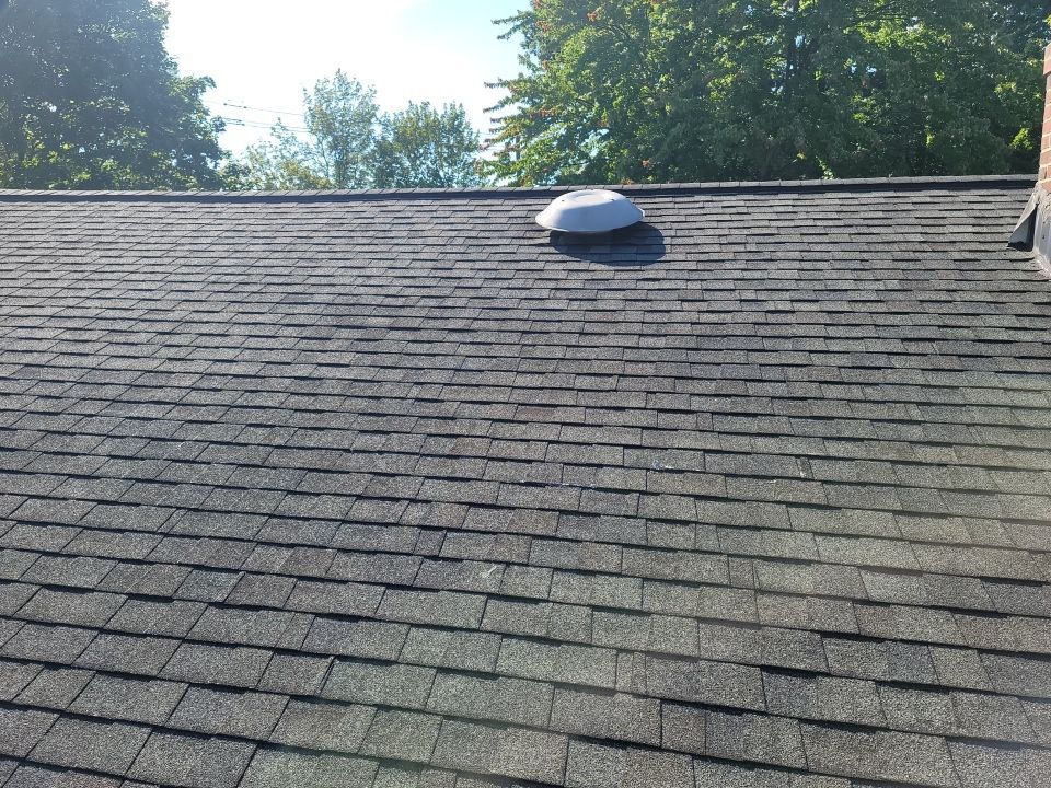 ATLAS PINNACLE COLOR: PRISTINE BLACK SHADOW DRIP EDGE: WHITE by Eagle Eye Roofing