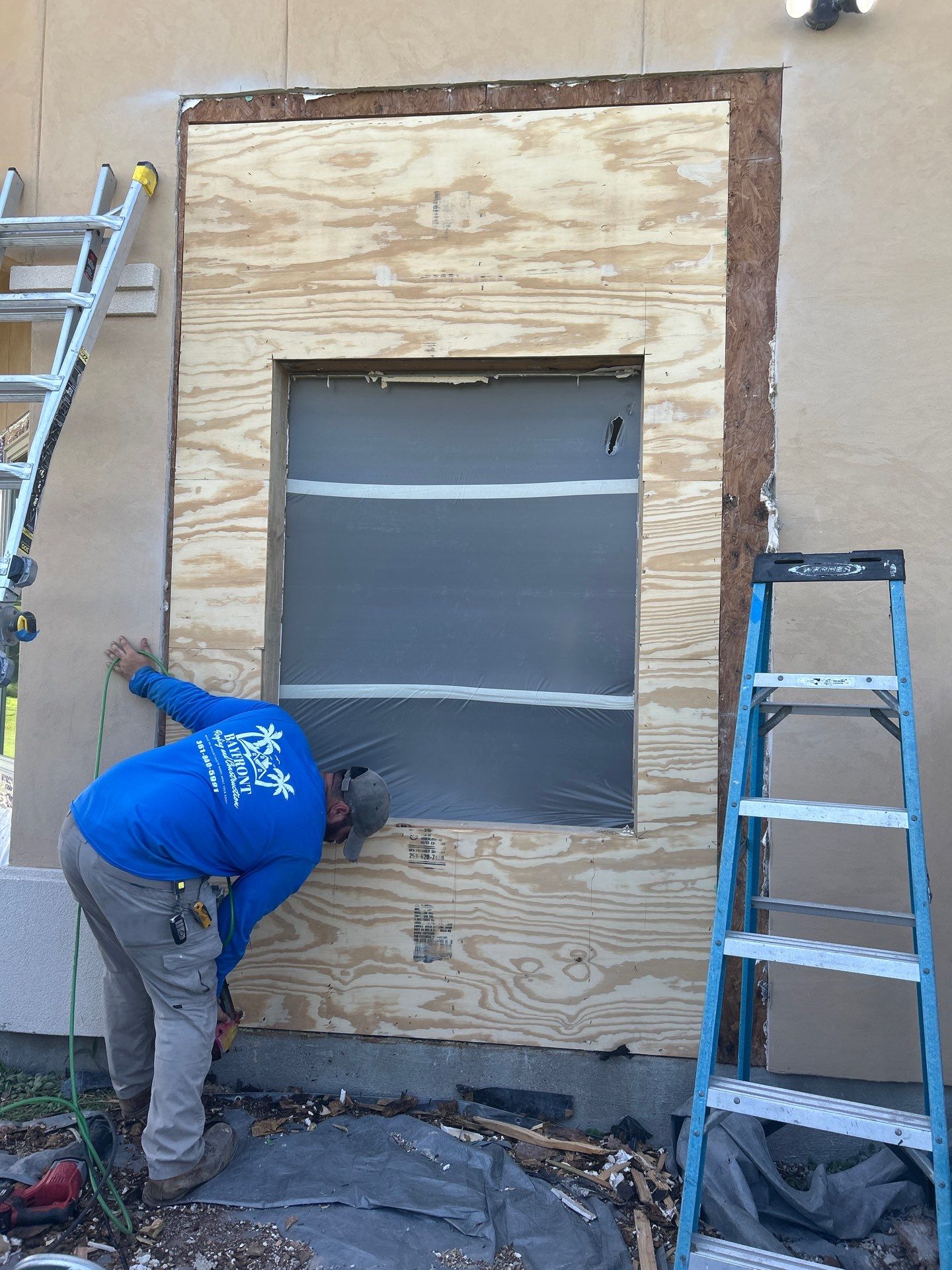 Installing Windows on a Submarine  by Bayfront Roofing and Construction