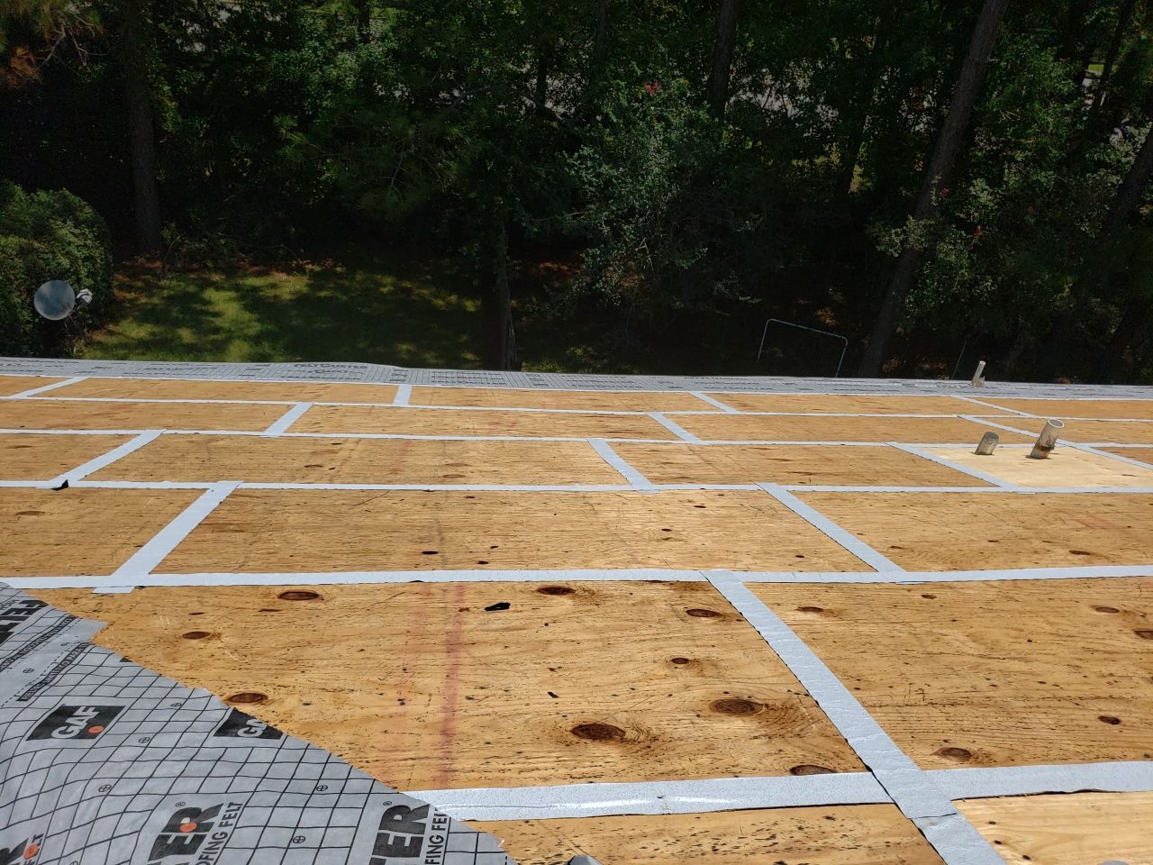 Residential Roofing Installation using Roof Replacement by American Roofing & Construction LLC