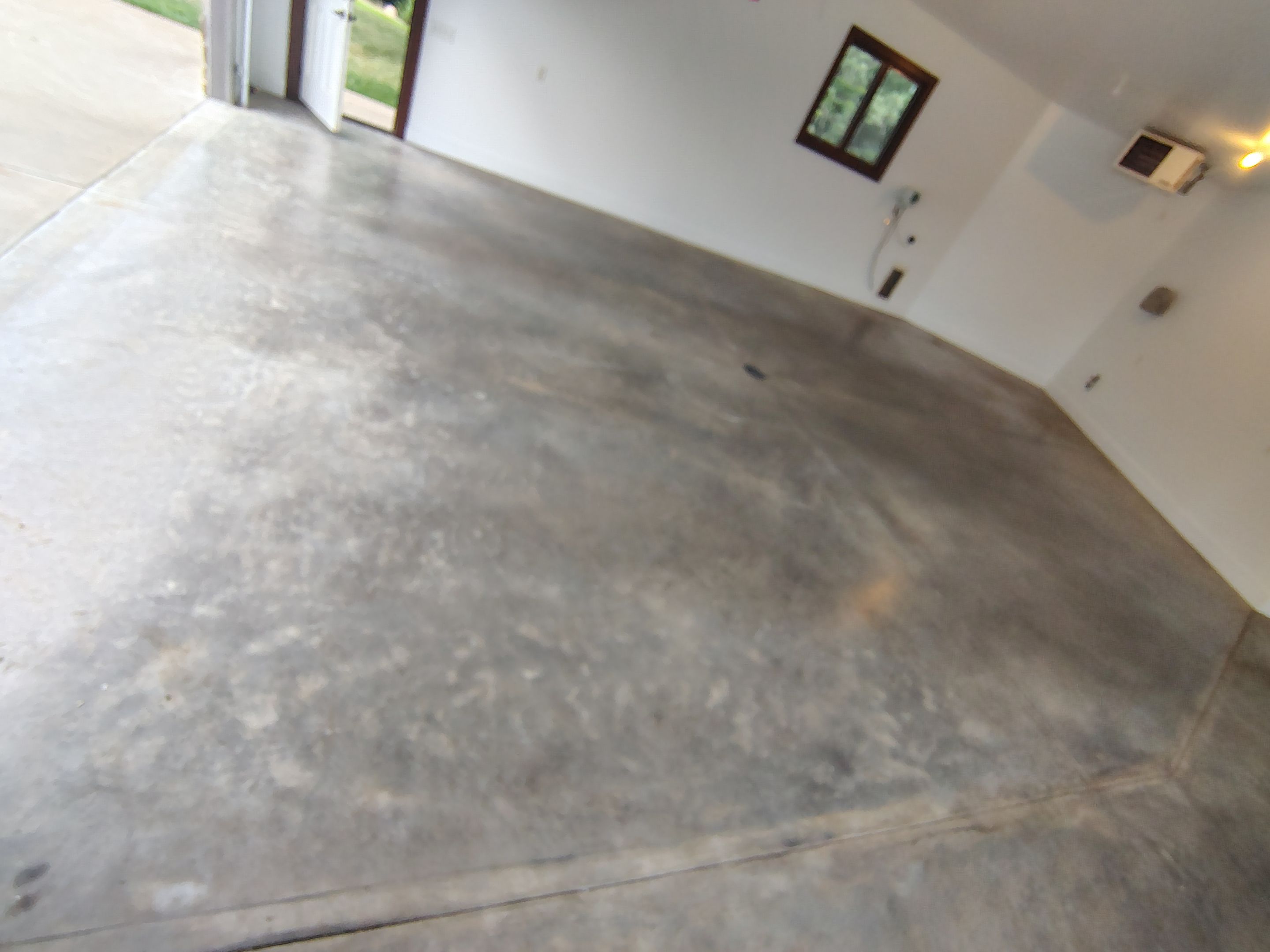 Feather Grey Floor Coating in Sioux Falls, SD by Select Painting, Coatings & Garage Cabinets