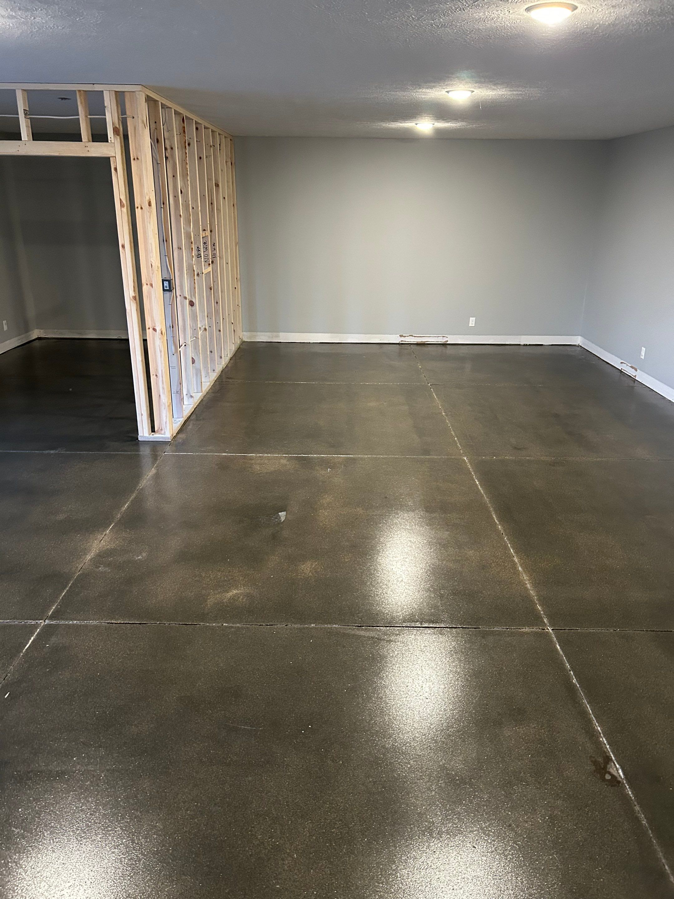 Industrial Basement Renovation! by Revival Concrete Coatings, LLC
