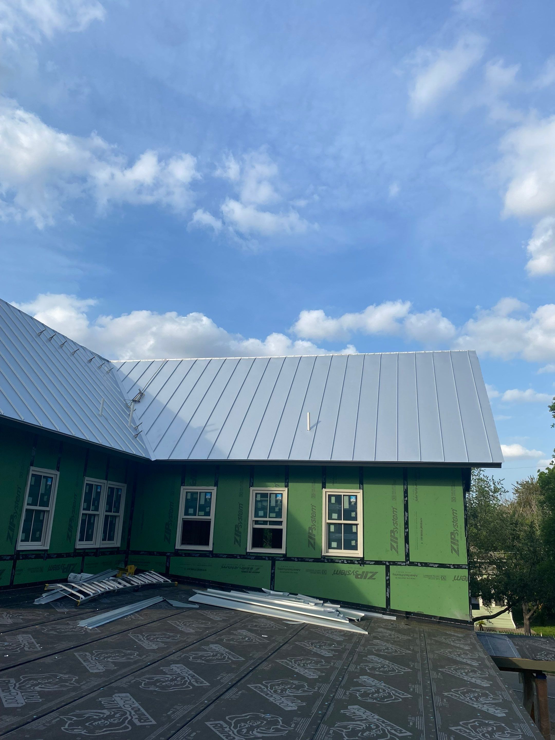 Residential Metal Roof Installation using McElroy Metal by Premier Roofing and Contracting