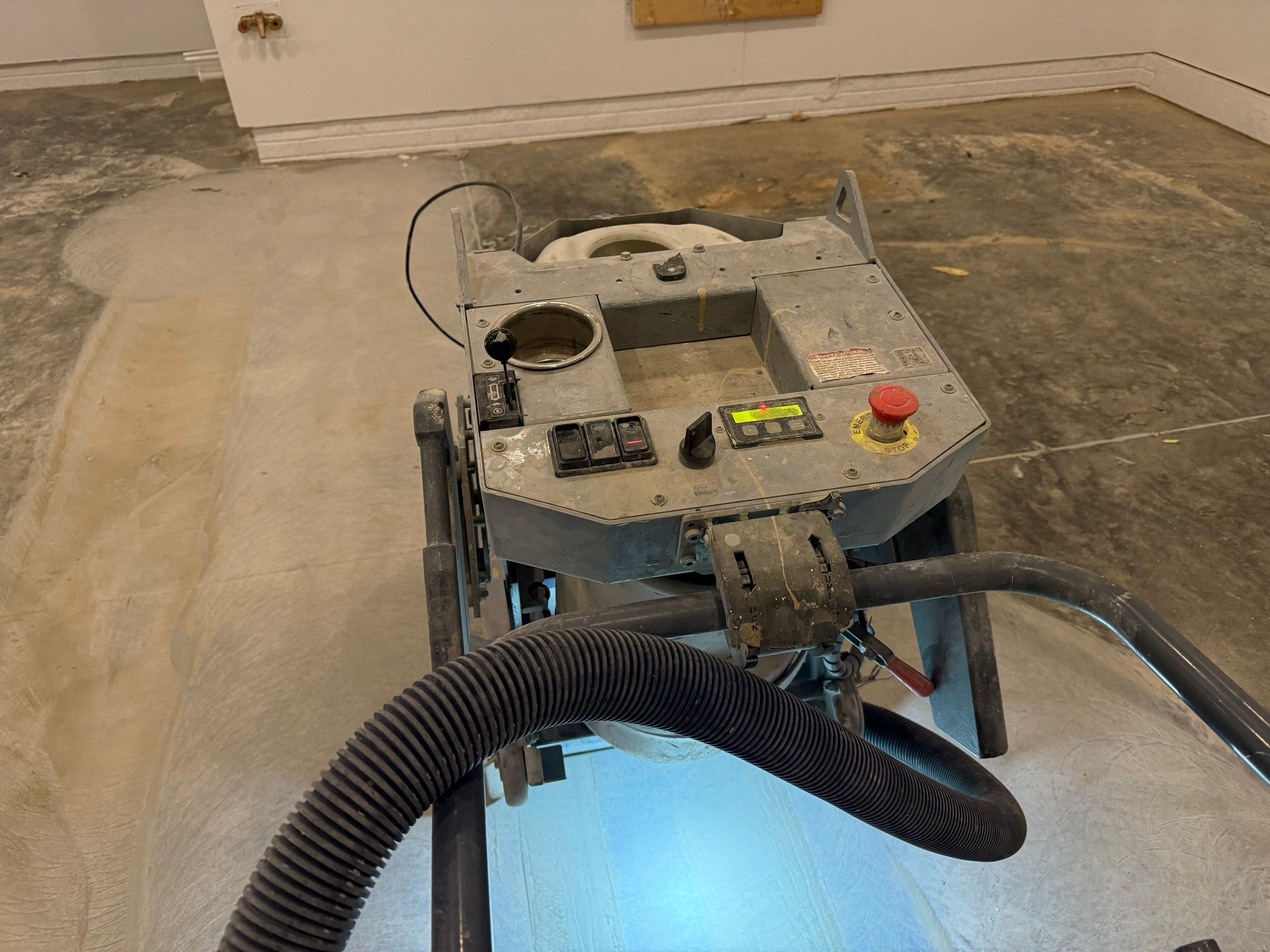 Multi-Car Garage Epoxy Floor Coating and Concrete Finishing in Sioux Falls by Select Painting, Coatings & Garage Cabinets