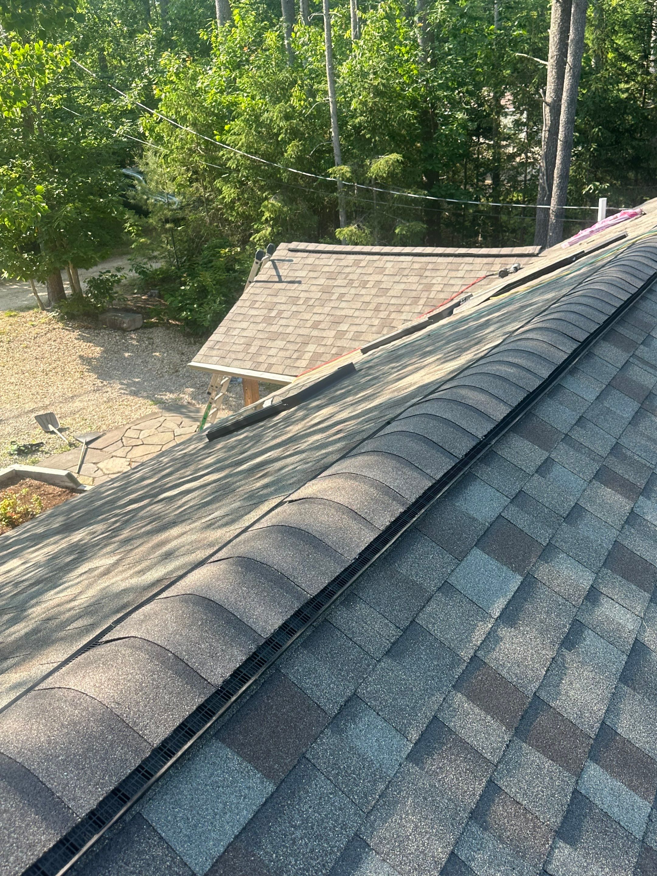 OC Roof Install On The Lake In Deerfield, New Hampshire by Tall pine roofing