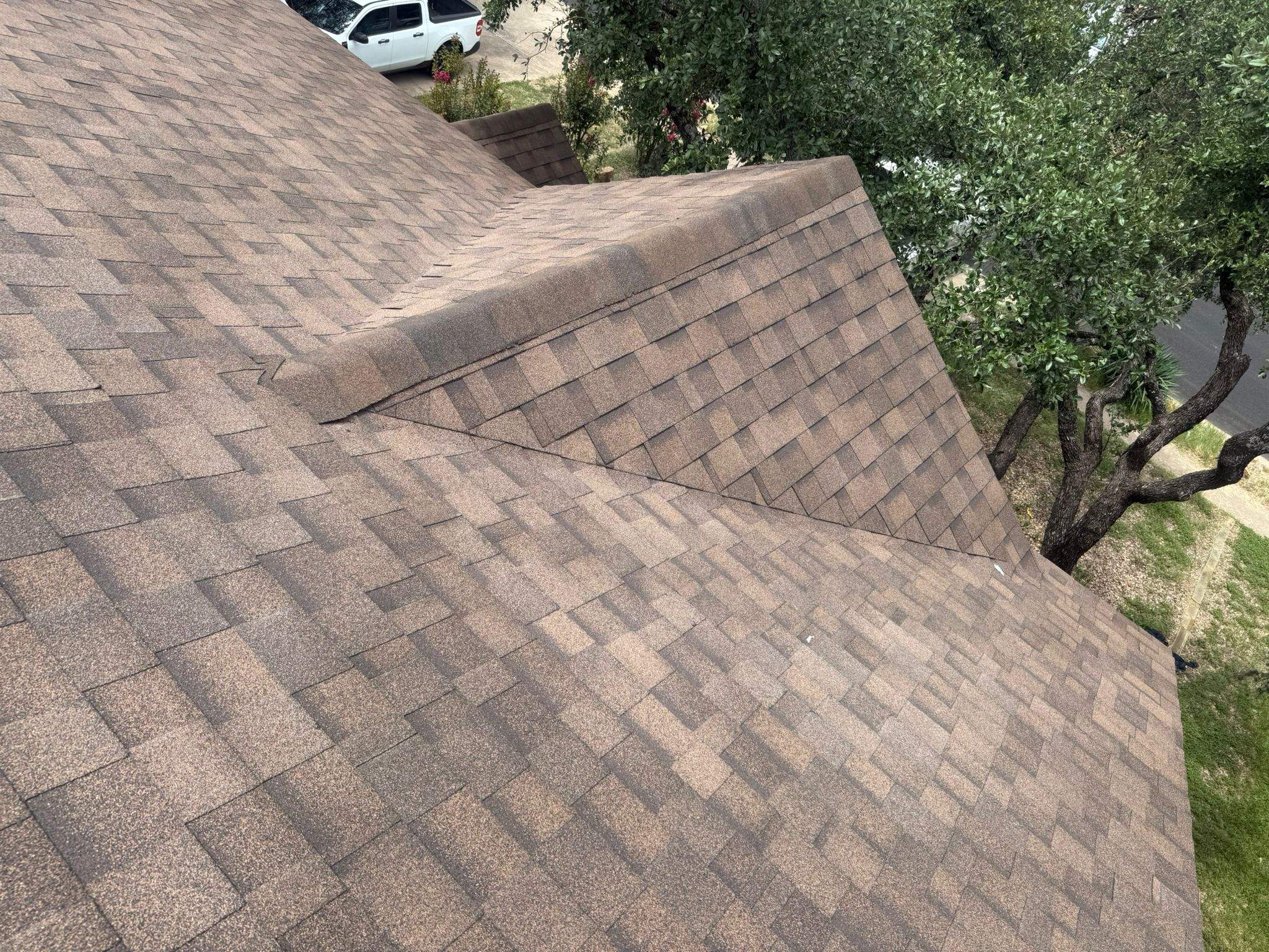 Residential Roofing Replacement and Chimney Flashing Repair in Austin by Caliber Restoration LLC