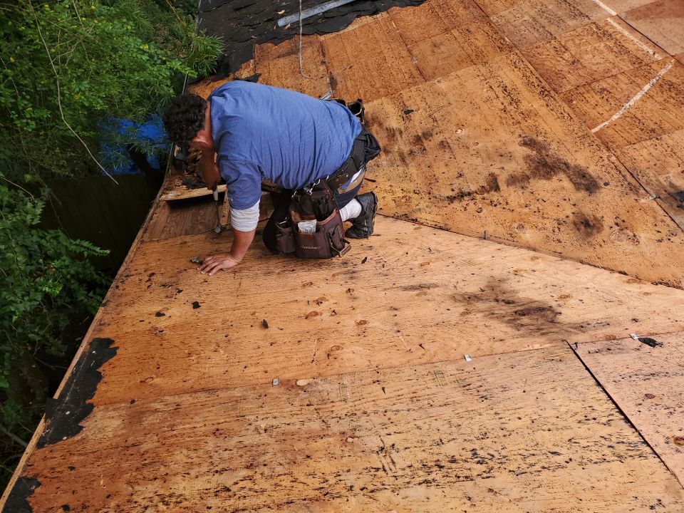 Residential Roofing Installation using Roof Replacement by American Roofing & Construction LLC
