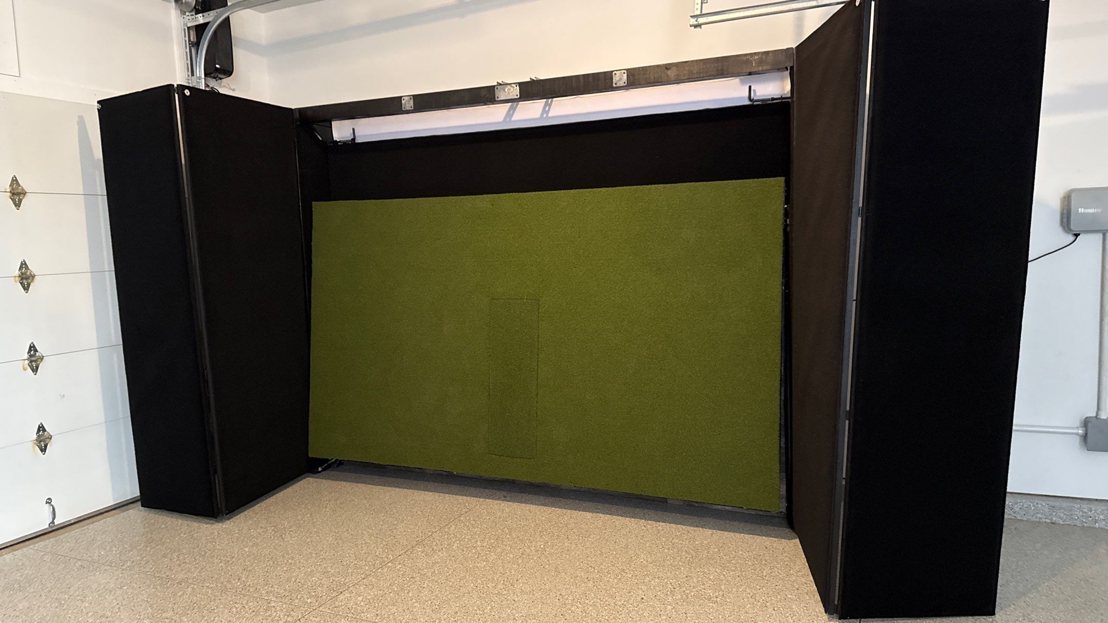 Ben Took It To The Next Level With a Golf Simulator by Banner Garage