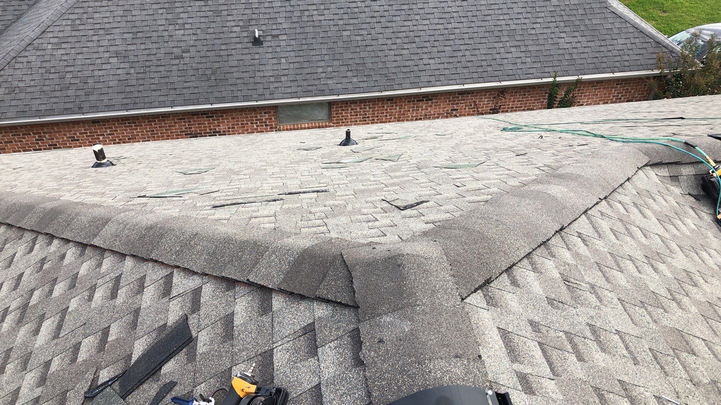 Residential Roofing Installation using Roof Replacement by American Roofing & Construction LLC