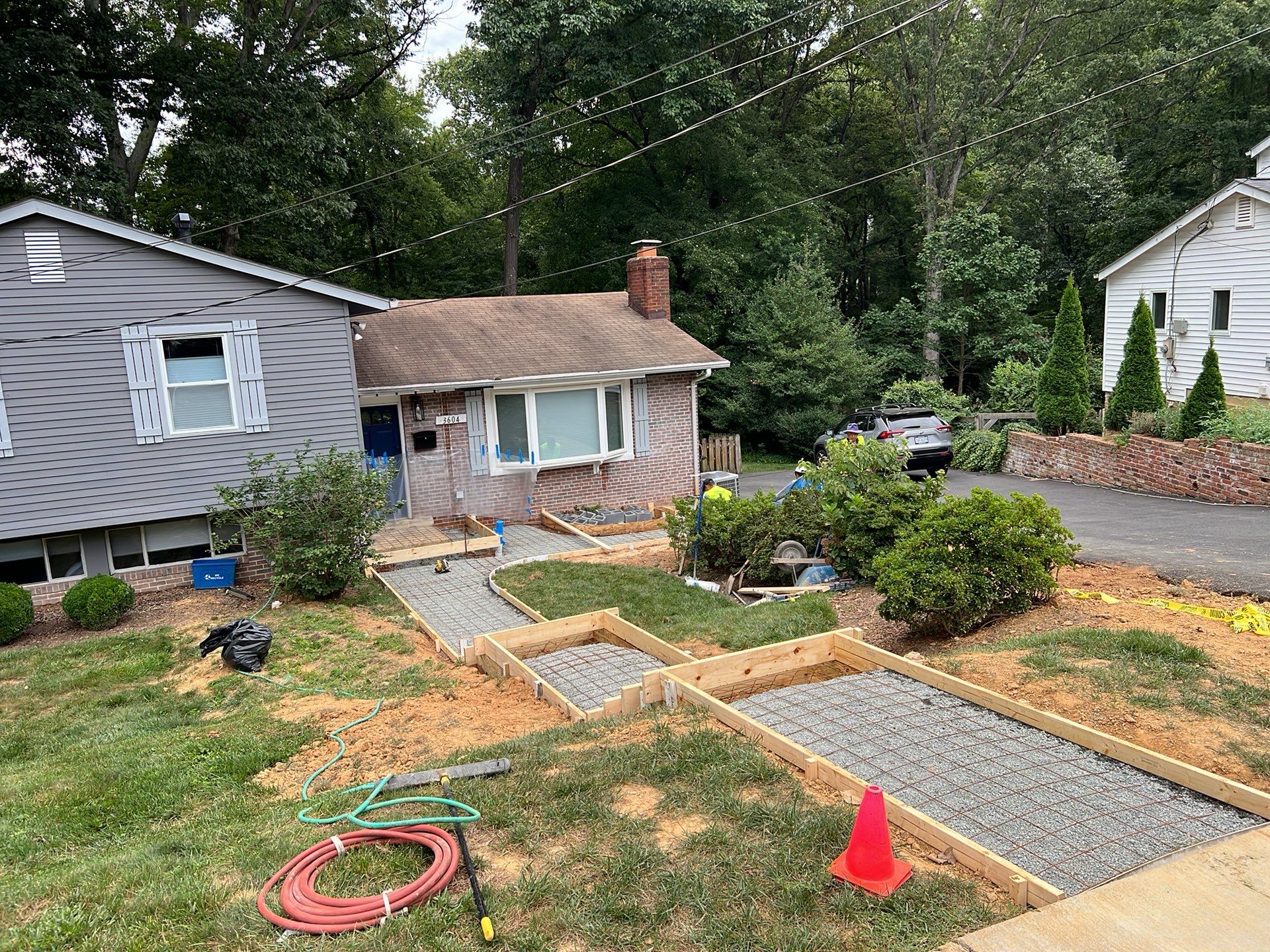 New walkway with stairs and a new front porch by Fairfax Contractors, LLC