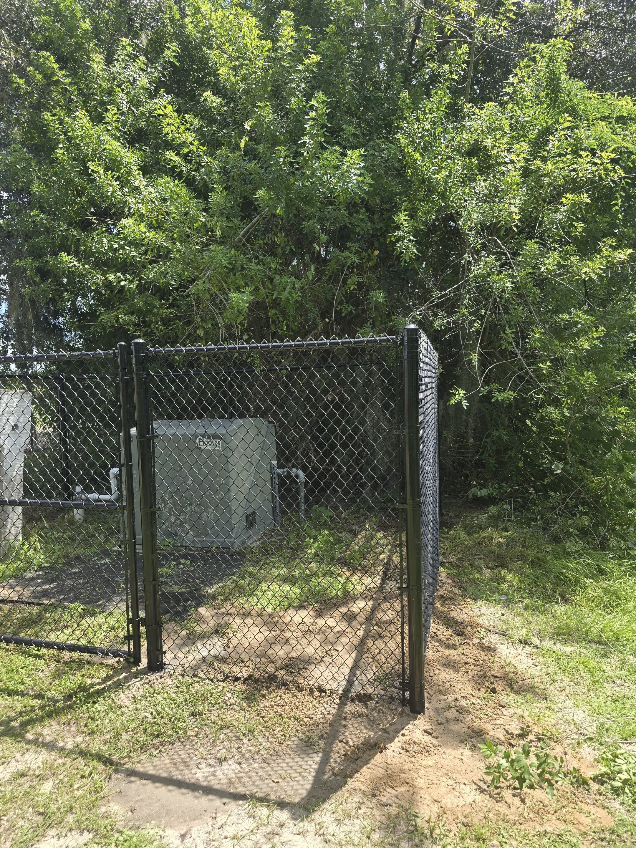 Commercial Black Chain Link Fence Installation in North Port by True Fence LLC