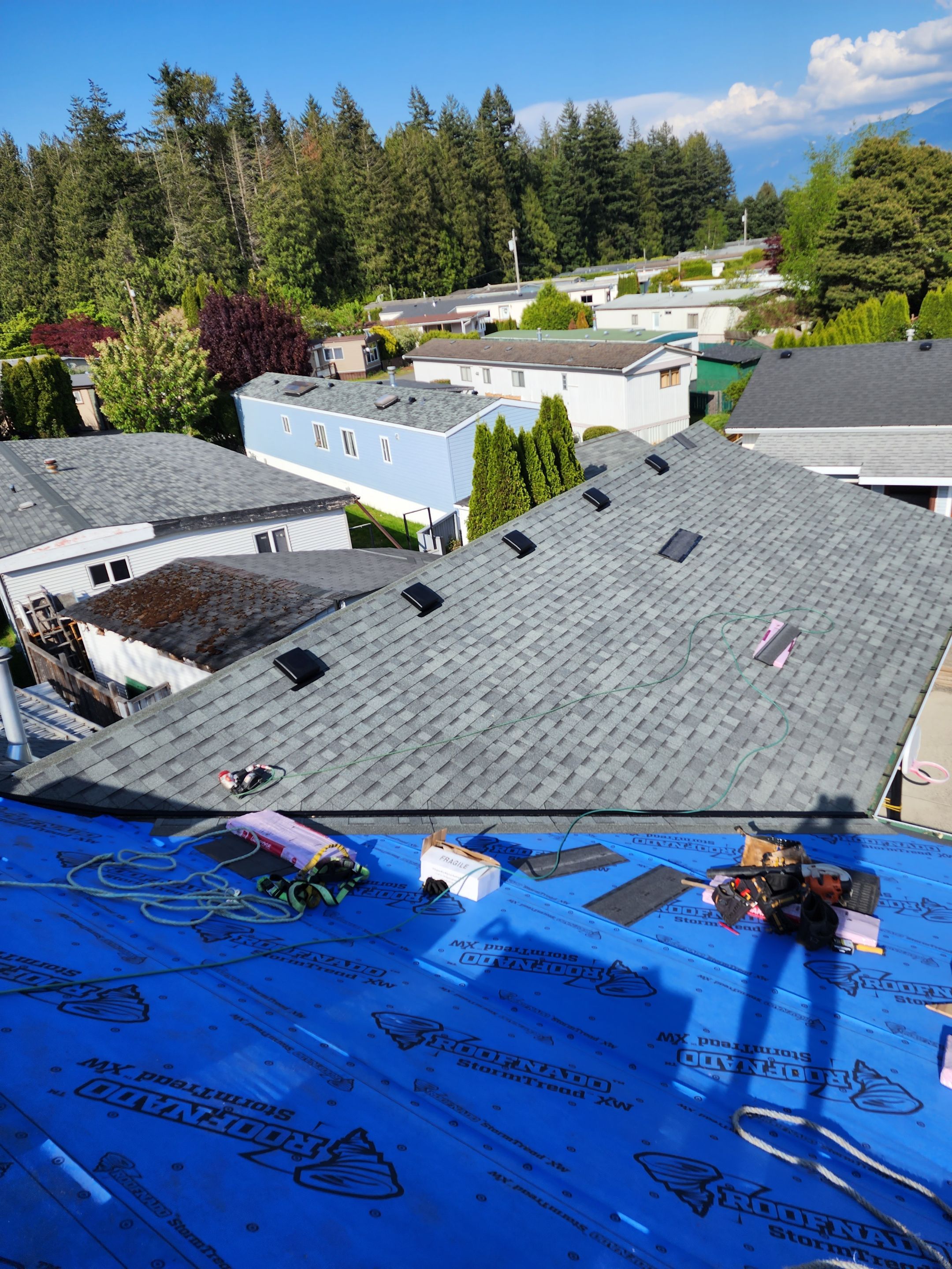 Residential Roofing Installation using Estate Gray Shingles by Top Notch Roofing Inc