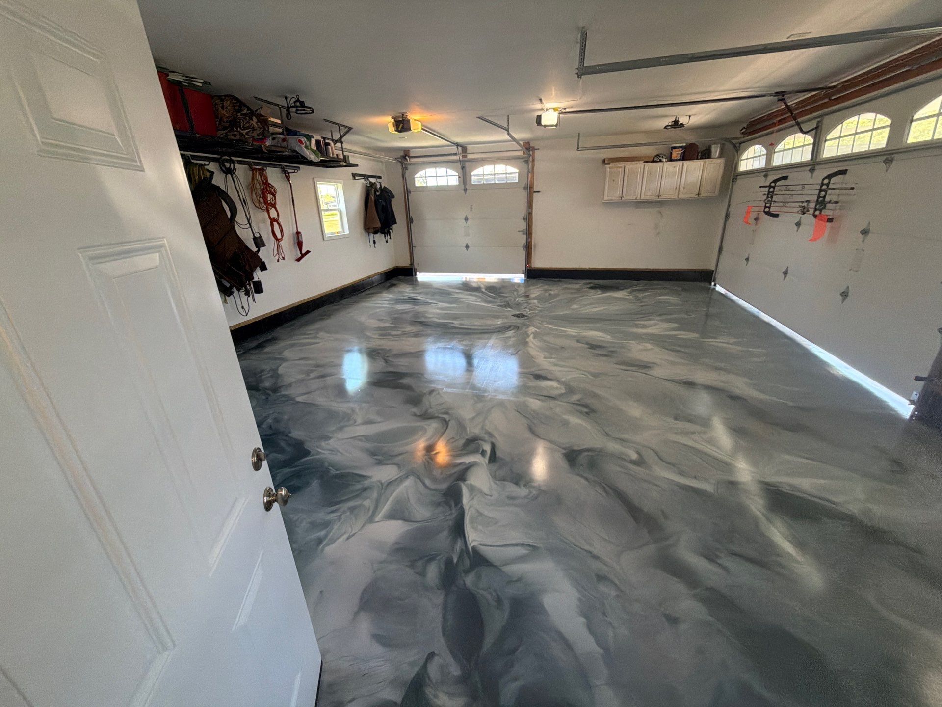 Custom Metallic Epoxy Floor and Polished Countertop Installation in Mears by Gordon Painting
