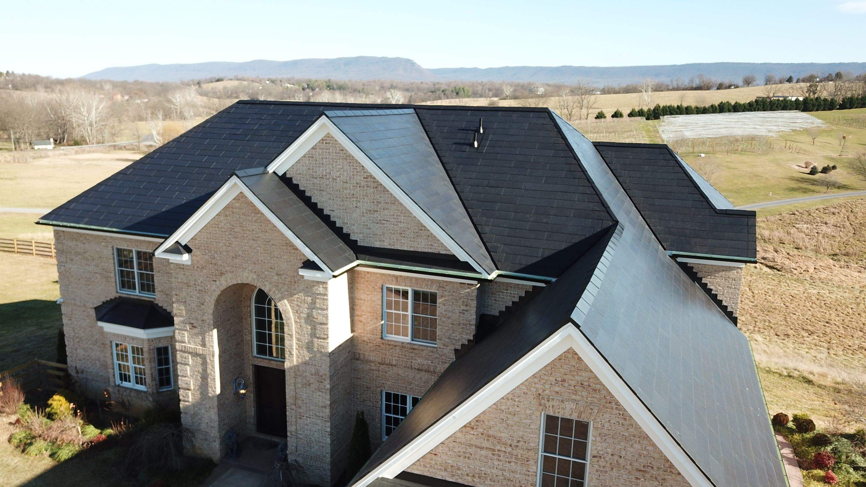 Tesla Solar Roof Replacement by American Home Contractors