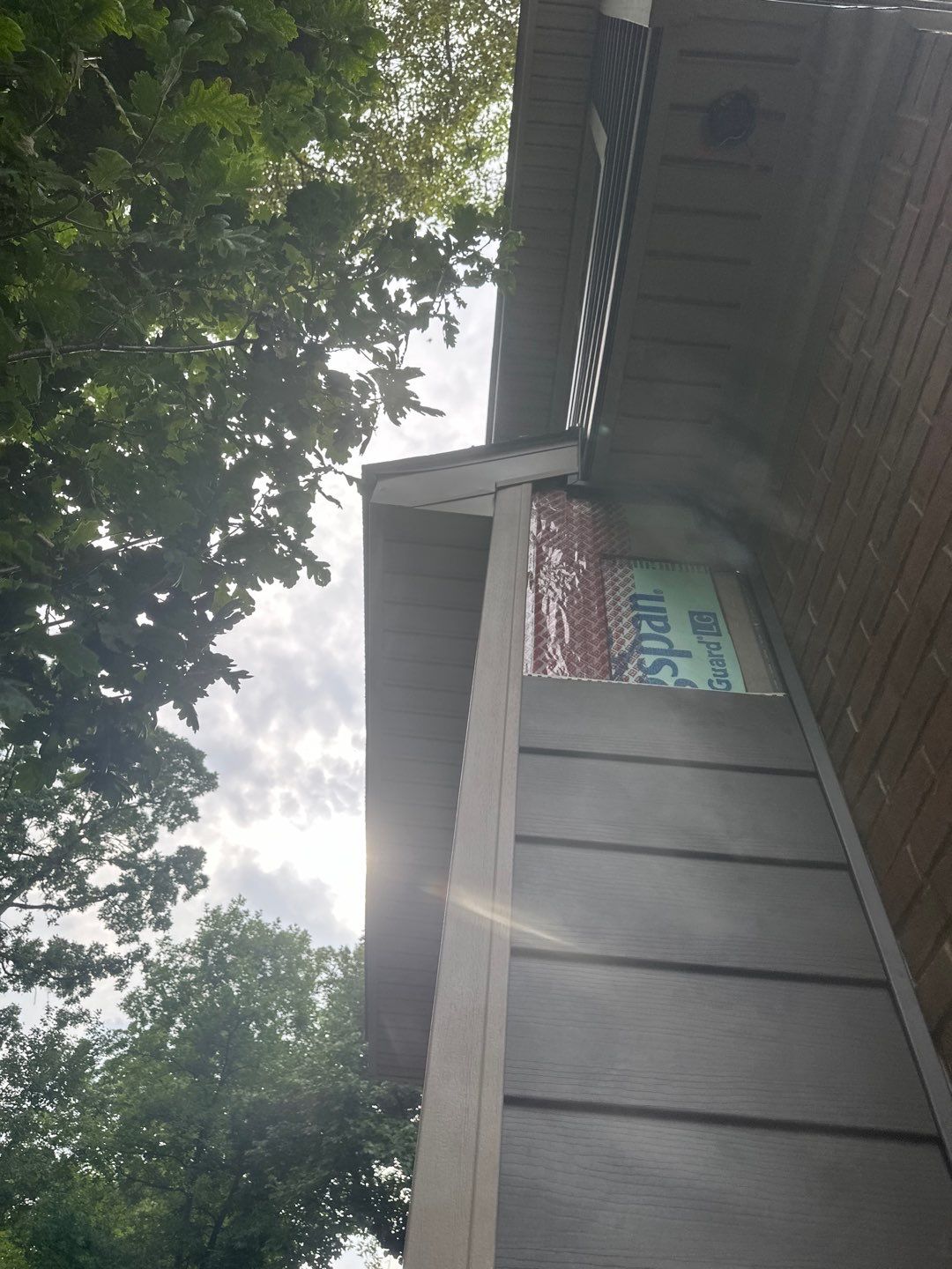 Roof Replacement using Owens Corning Peppercorn and Siding Replacement using Ascend Charcoal Smoke by 180 Contractors