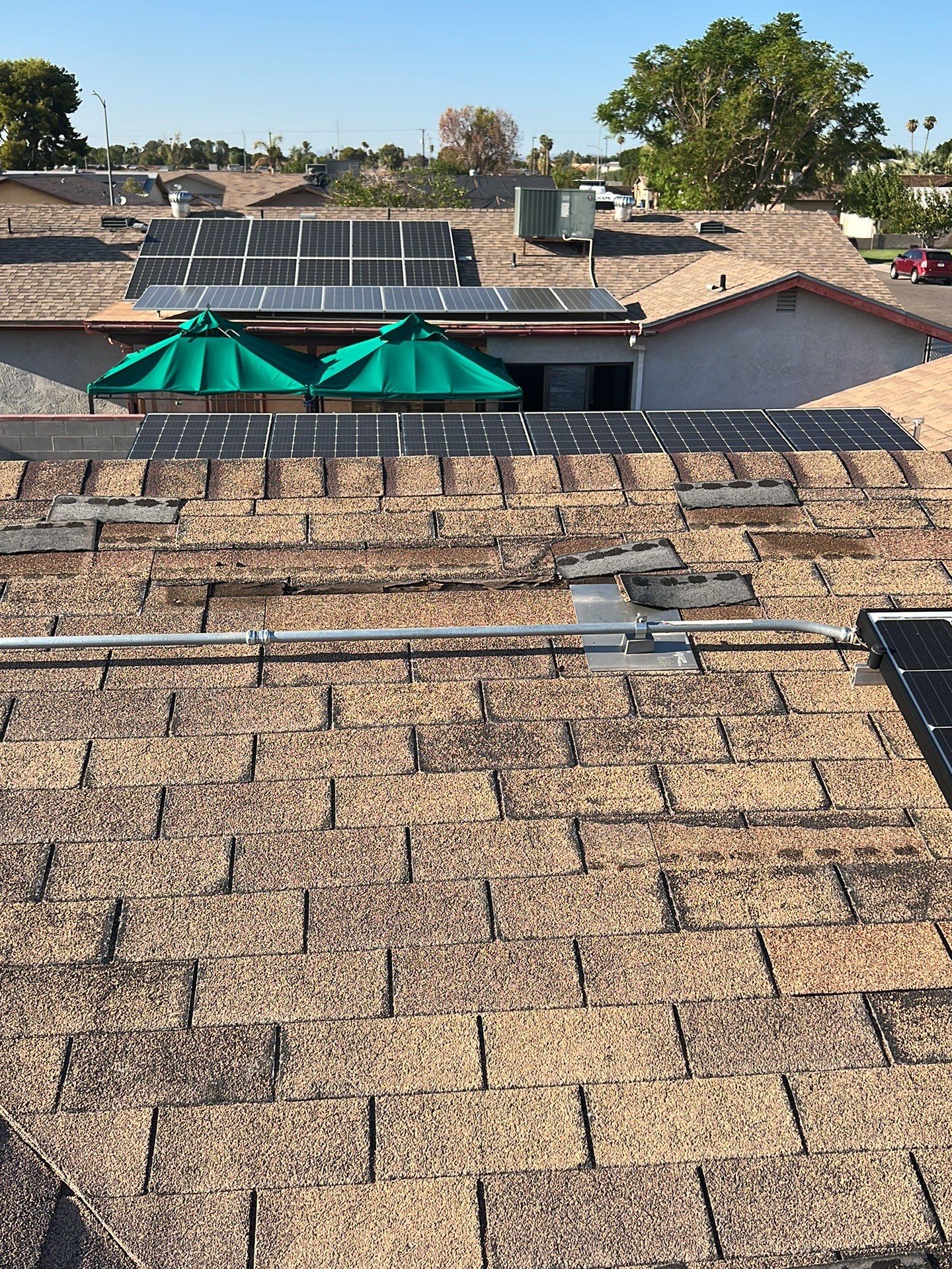 Charcoal Shingles by Reimagine Roofing