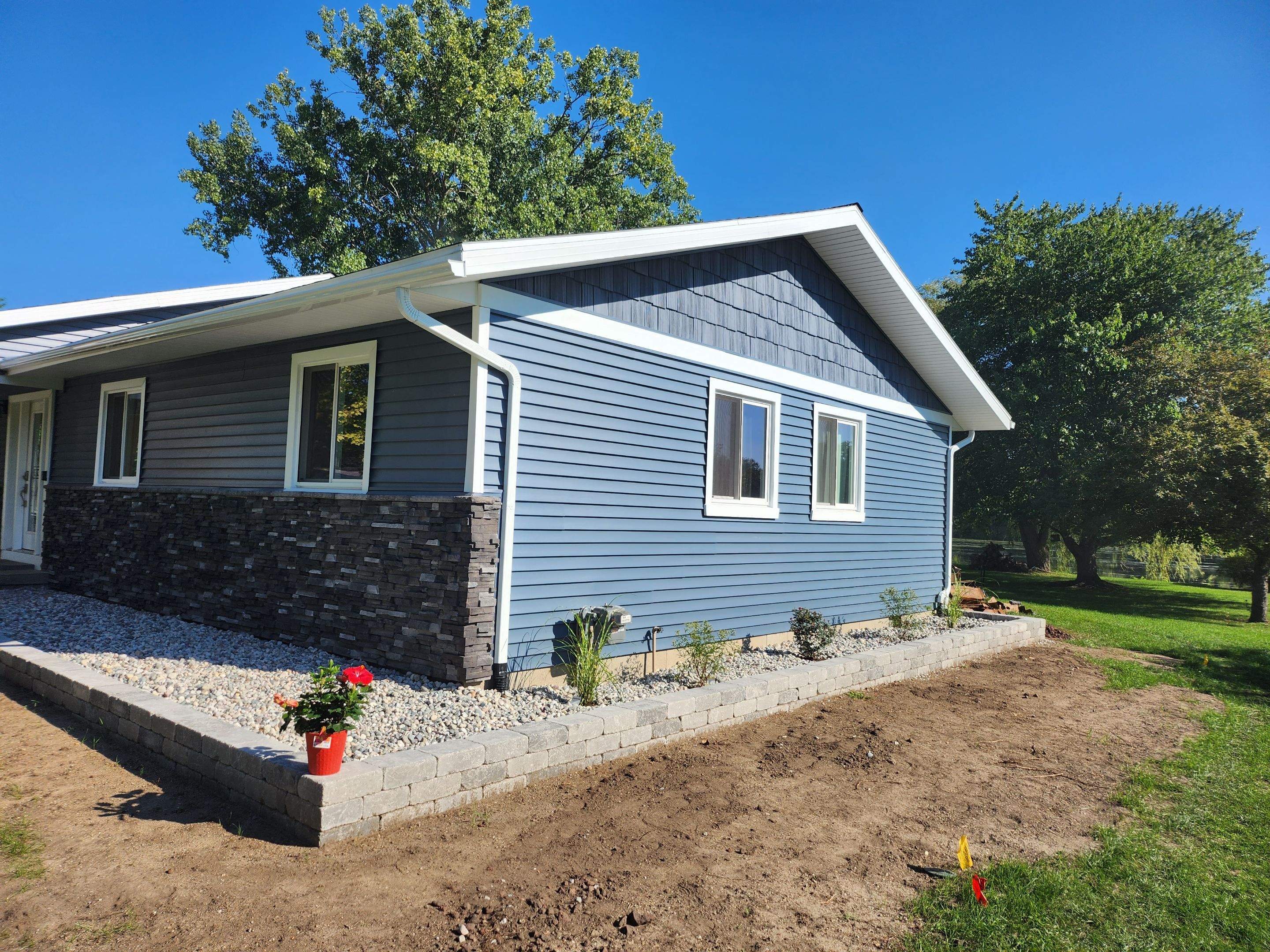We gave this house a huge make over! by Energy Plus Home Improvements