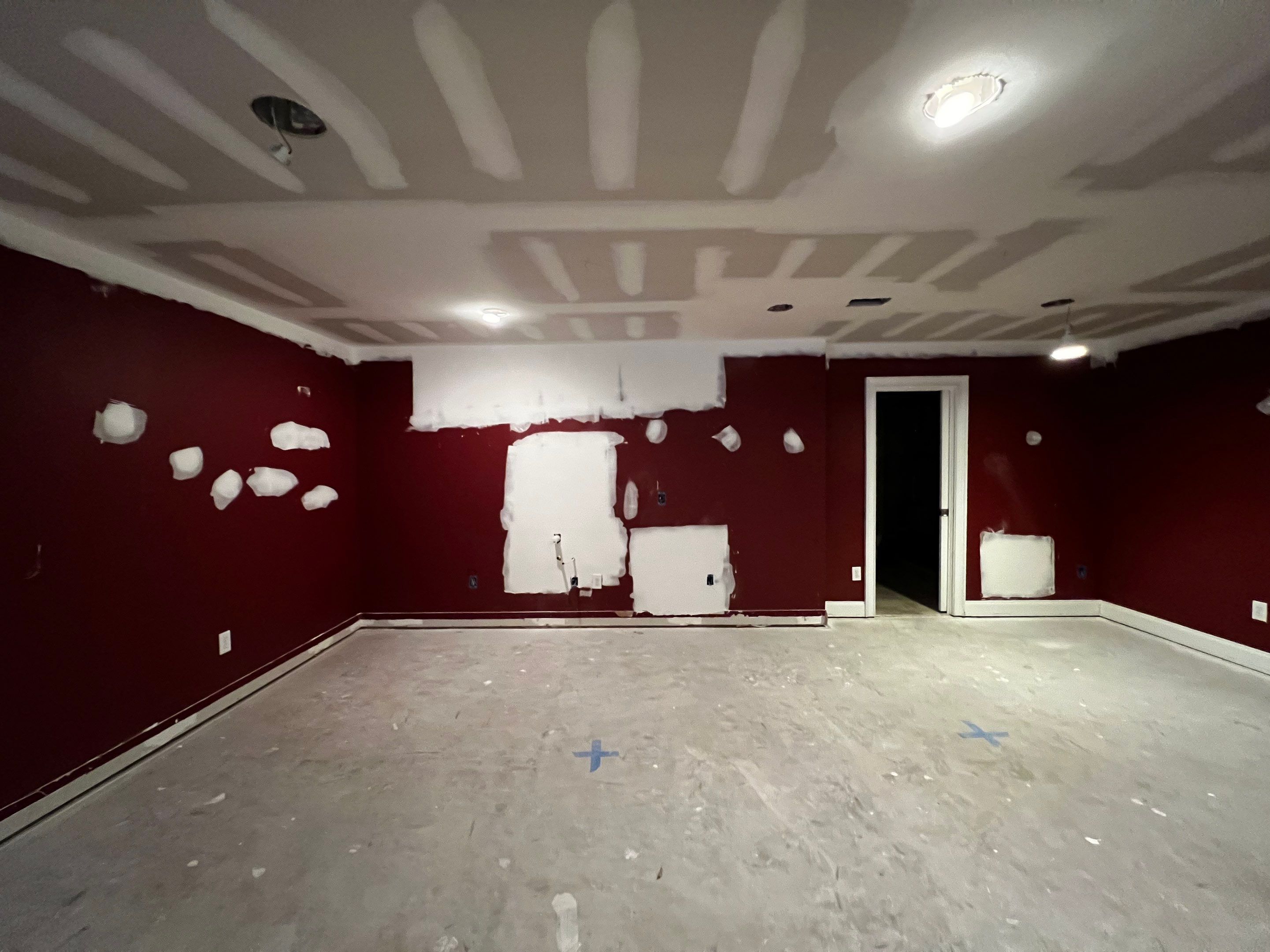 Modern Basement Remodeling in Woodstock with Custom Live-Edge Bar by Swift Home Renovations