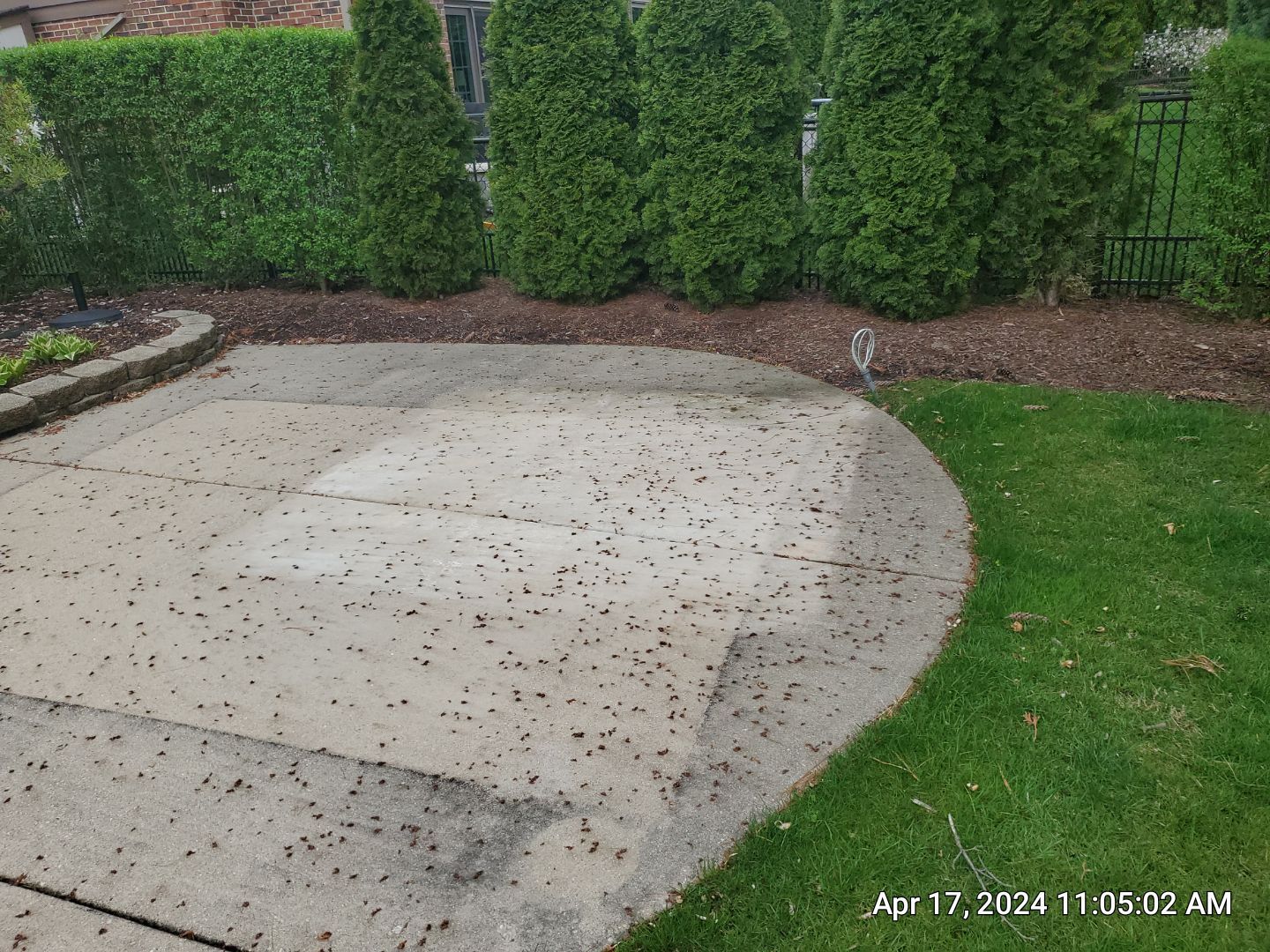concrete patio and driveway cleaning by Northern Power Washing LLC.