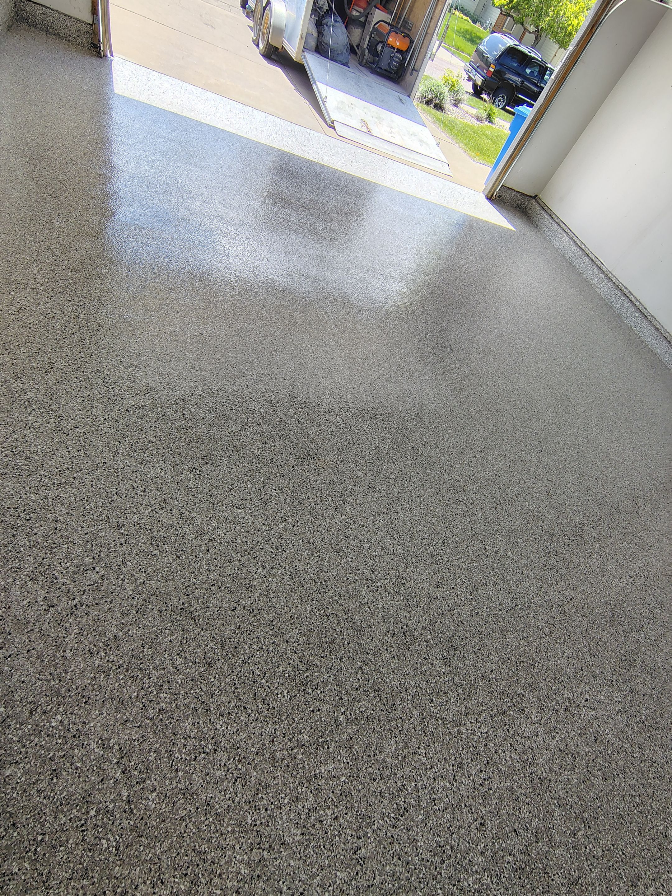 Decorative Chip Epoxy Garage Floor Coating in Sioux Falls by Select Painting, Coatings & Garage Cabinets