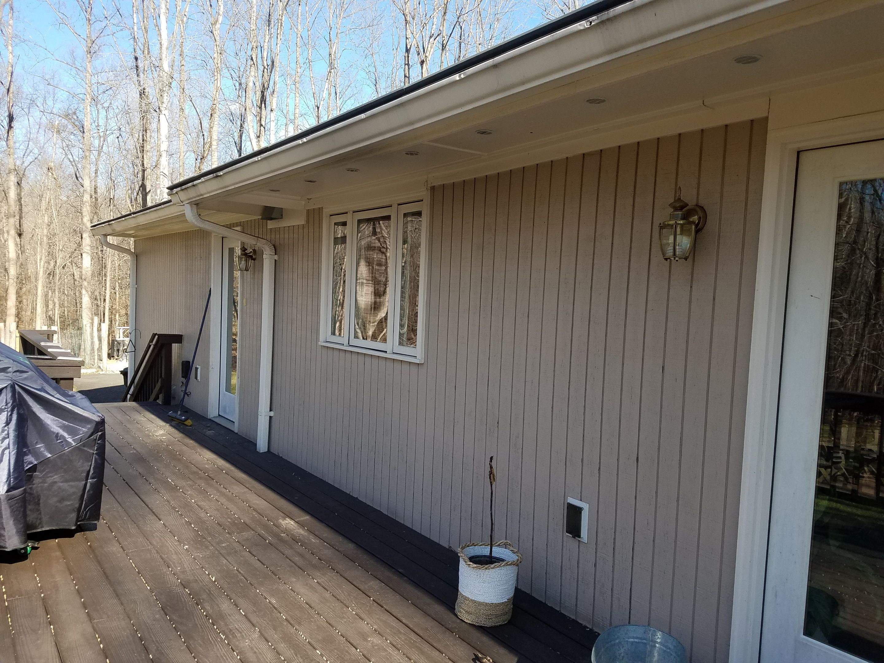 Roof, Siding, Door, and gutter replacement by American Home Contractors