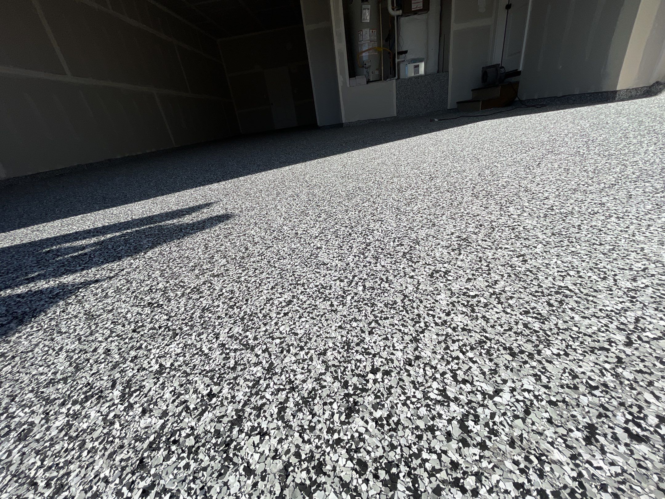 Garage Transformation using Domino by Croc Coatings, LLC