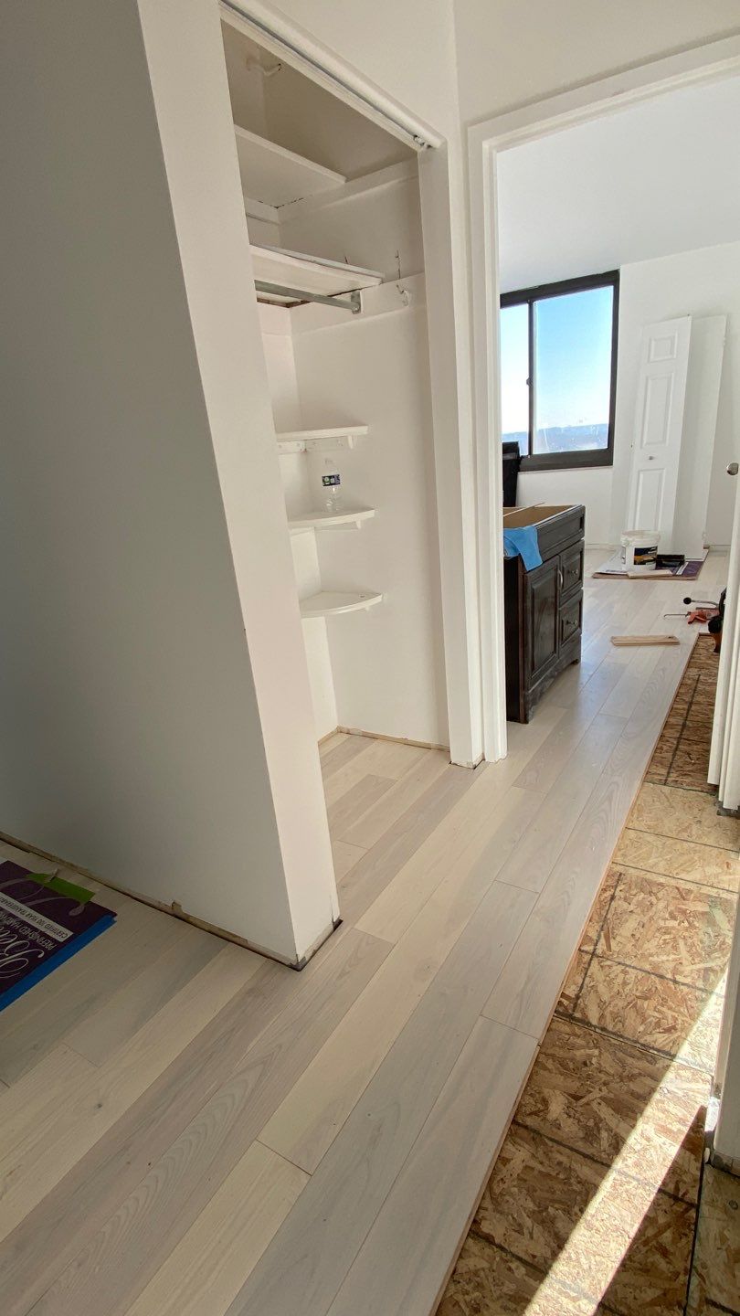 Apartament renovation  using Harwood floor  by Jesus Master Handyman LLC 