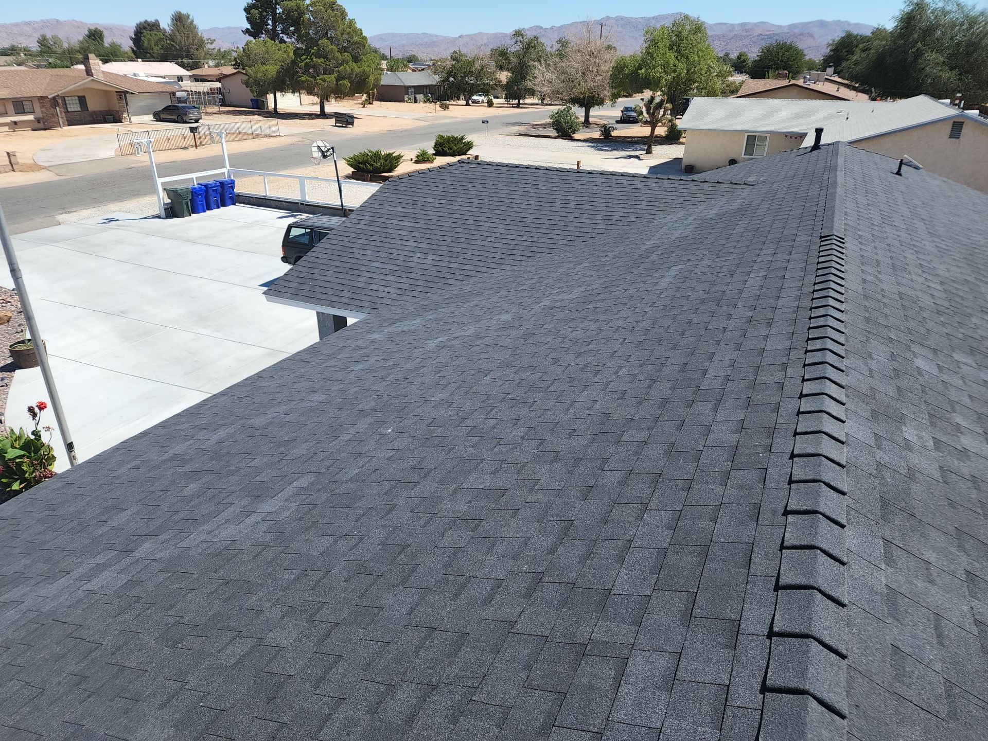 Onyx Black Shingles by Reimagine Roofing