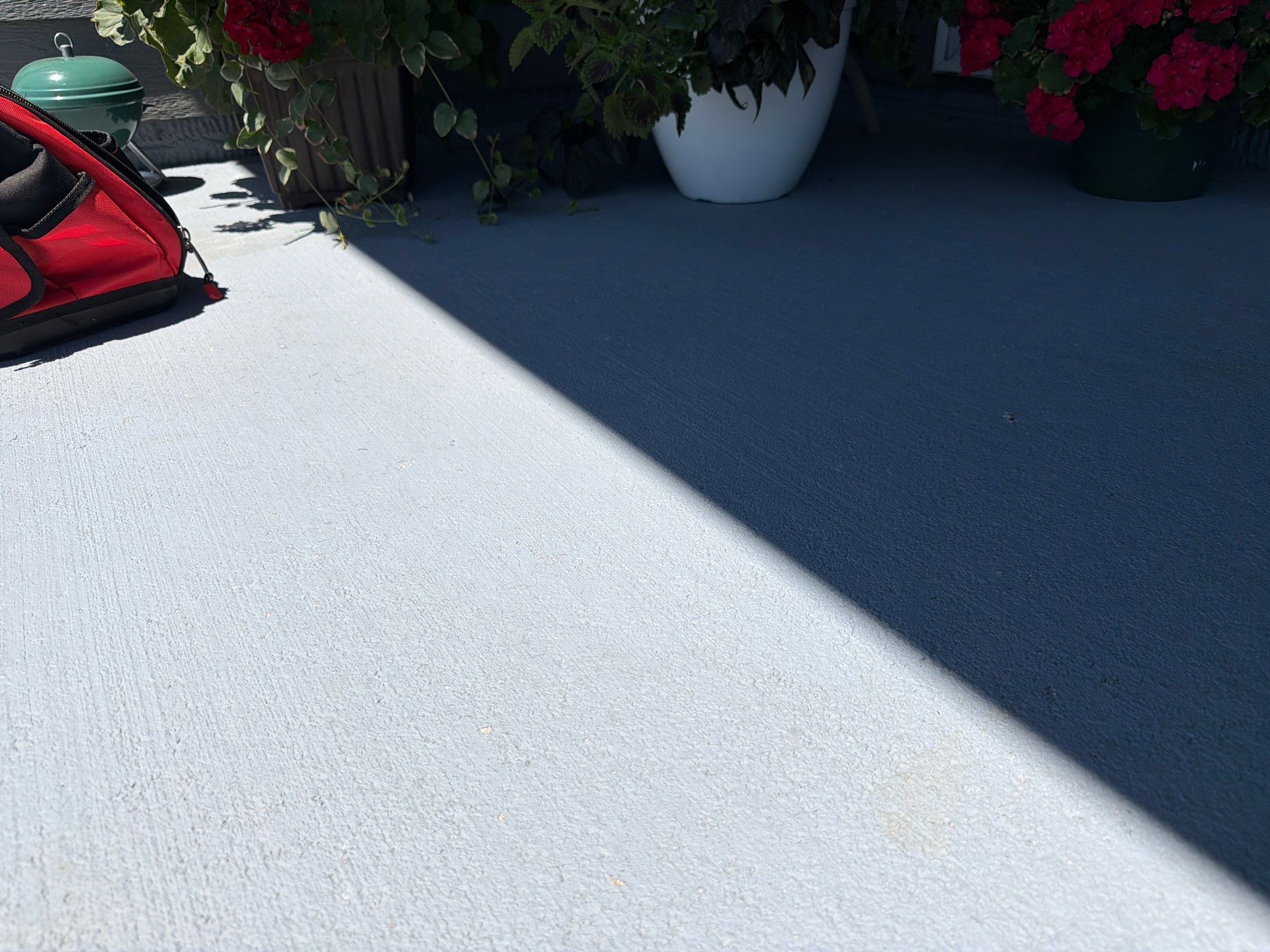 Starry Evening Concrete Patio Coating Installation in Tea by Select Painting, Coatings & Garage Cabinets