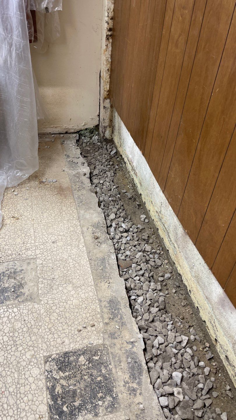 Interior Waterproofing Using GrateDrain™ Products by Toledo Basement Repair 