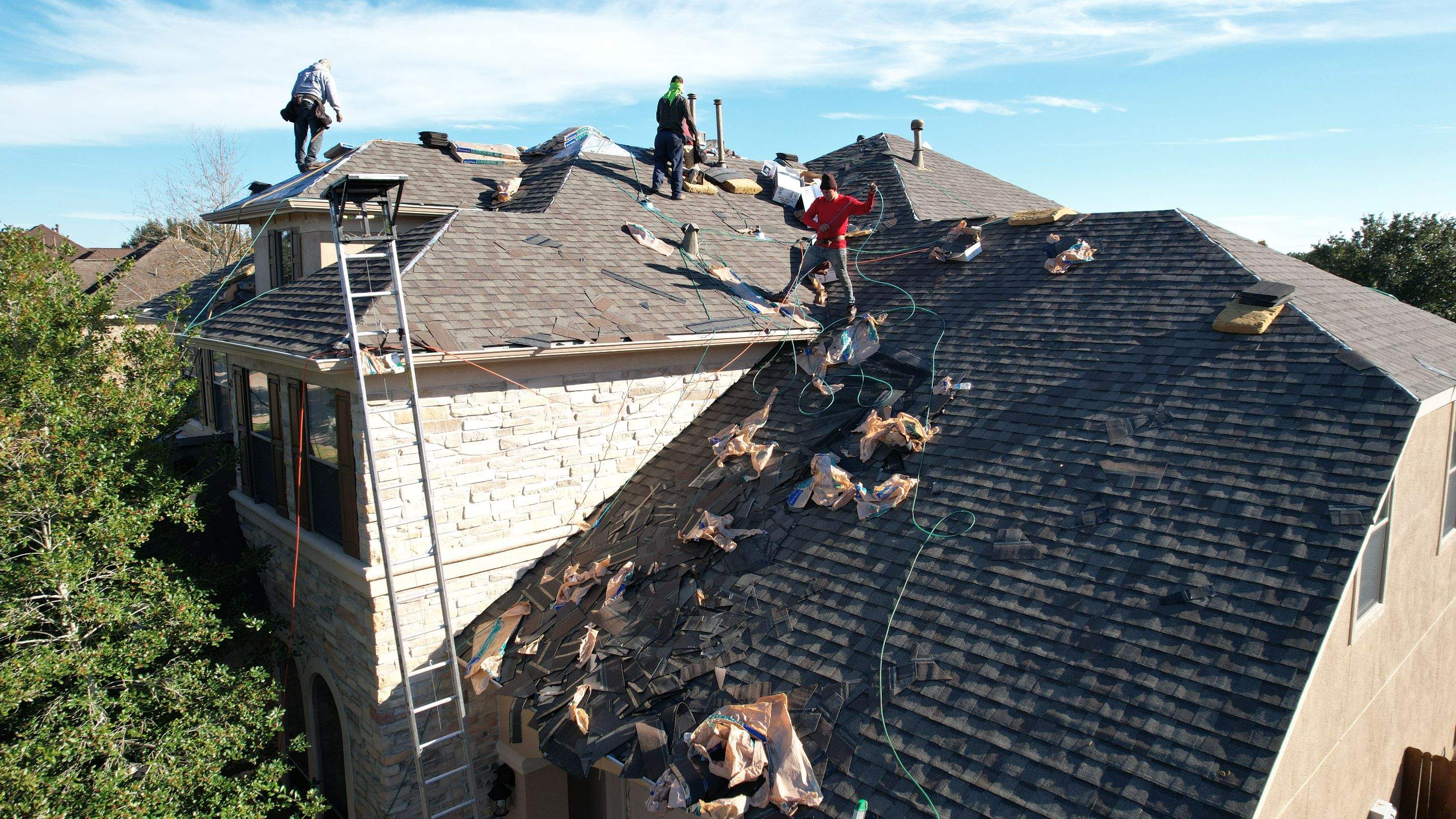 Two-Story Roof Replacement & Chimney Stucco Repair — Houston, TX by PL Roofing & SB Roofing, LLC.