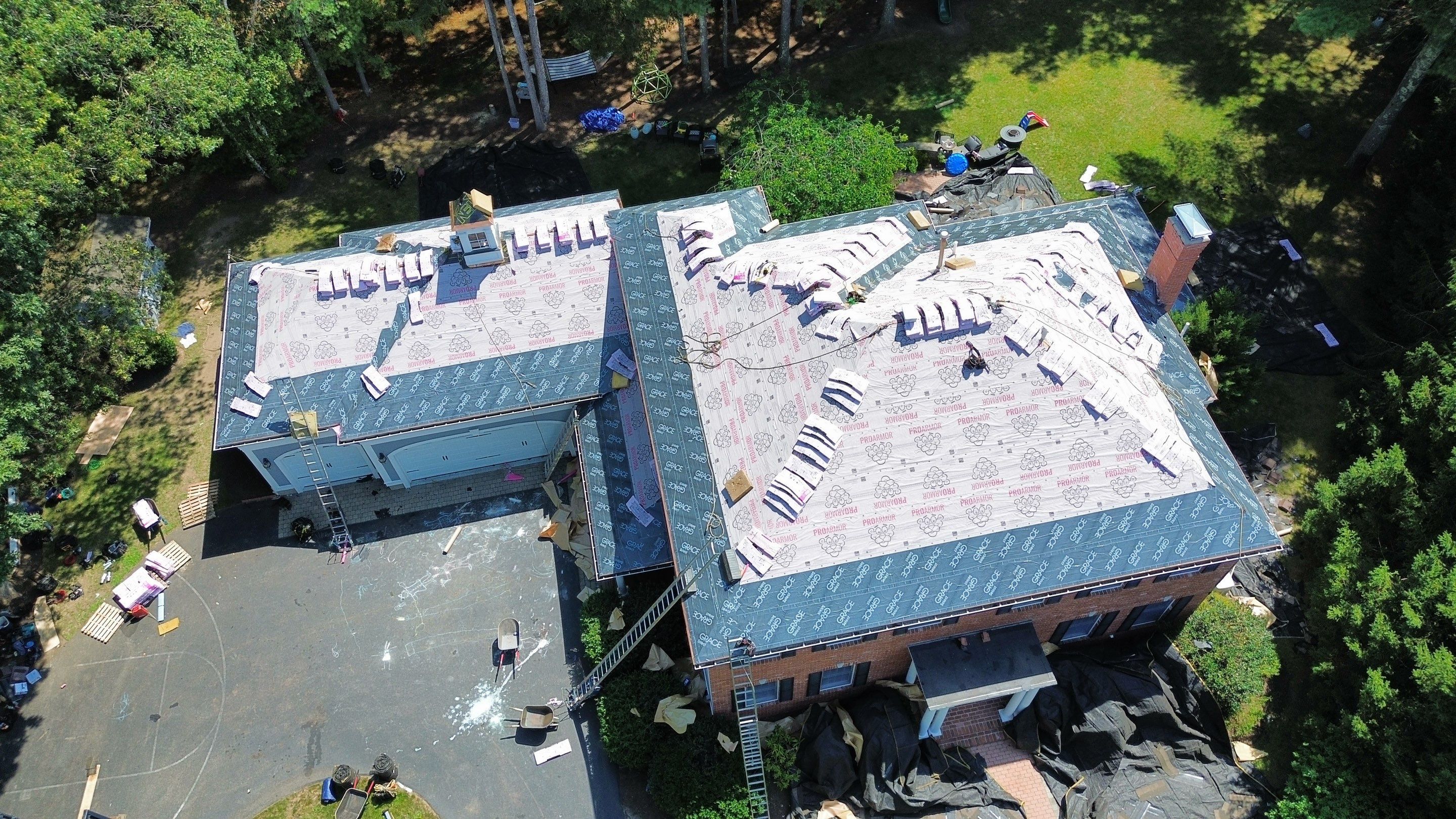 Roof Replacement & Gutter System Upgrade in Westford, MA by Mighty Dog Roofing of Greater Middlesex County
