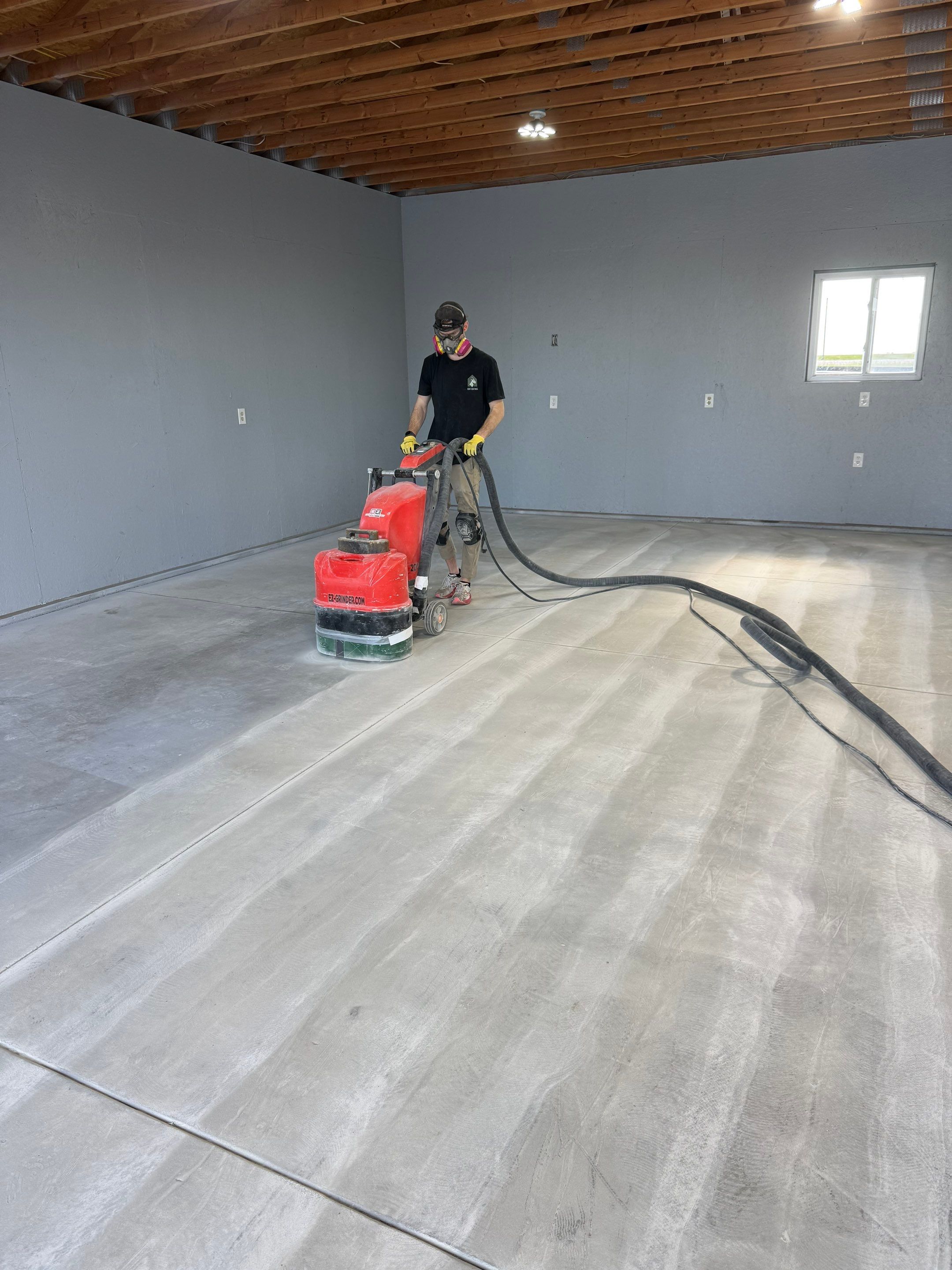 Four-Stall Garage Epoxy Floor Coating in Hampton by Goat Coatings