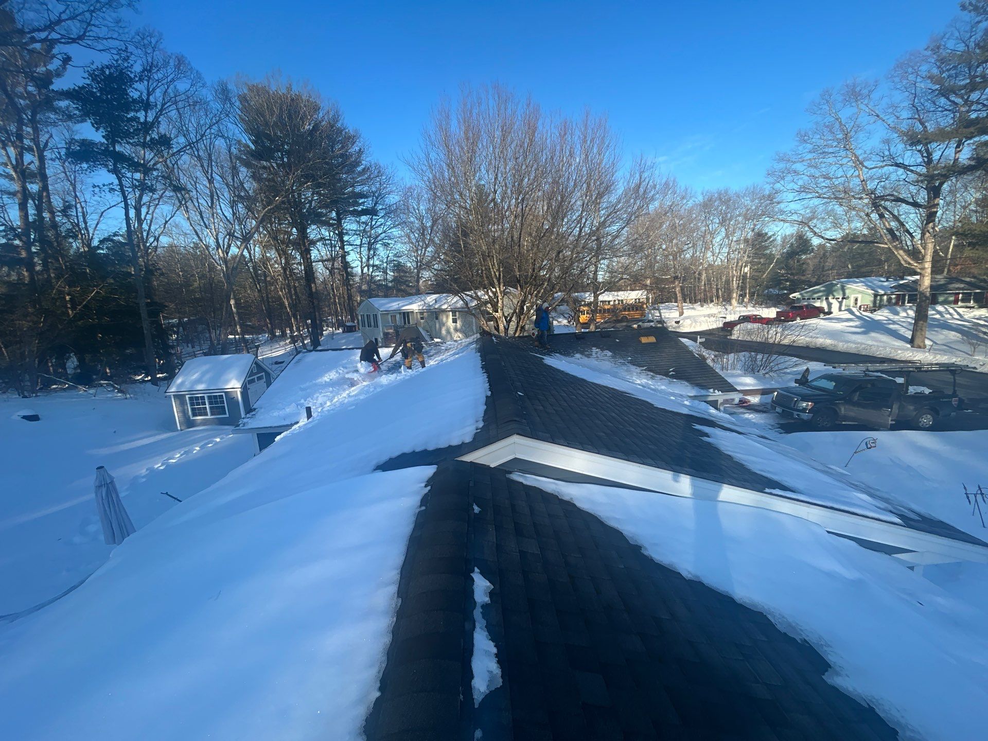 Ridge Cap Replacement & Black Metal Valley Installation in Chelmsford, MA by Mighty Dog Roofing of Greater Middlesex County