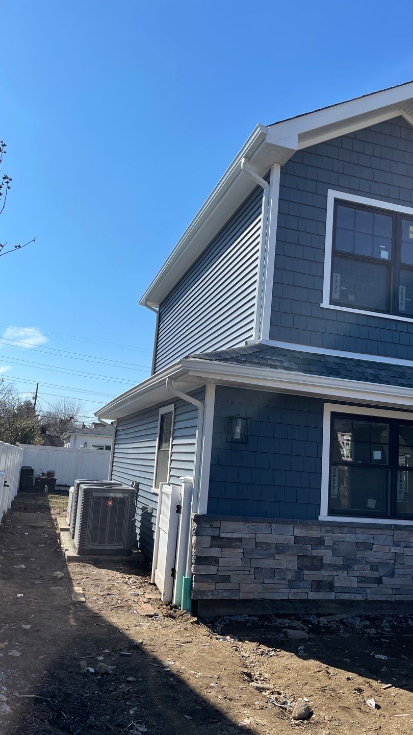 Full House Installation 5" white seamless gutters 2x3 leaders by Above All Gutters