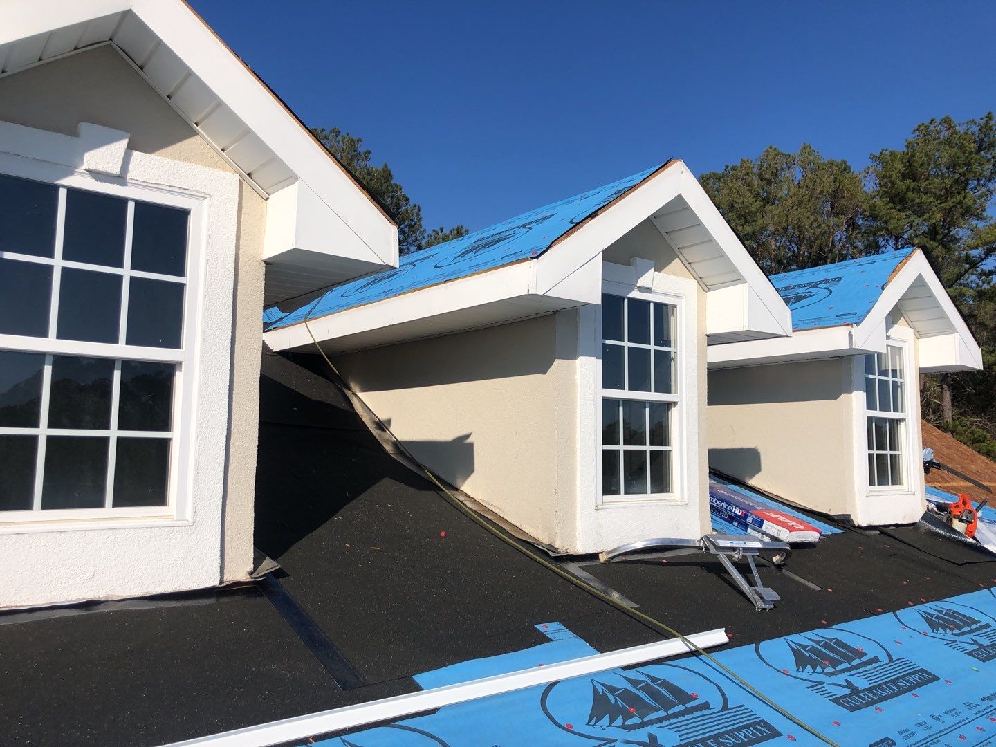 Residential Roofing Installation using Roof Replacement by American Roofing & Construction LLC