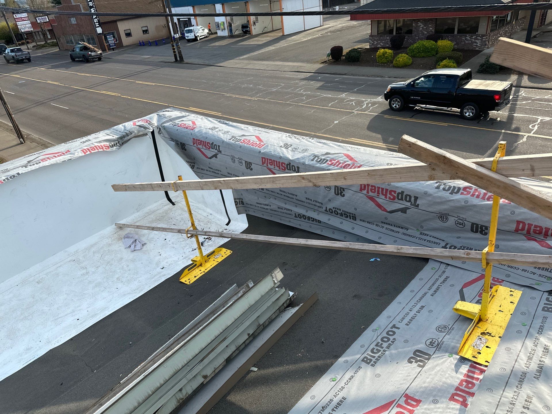 Commercial Roofing Installation using IKO Dynasty & GAF 60Mil TPO by Orezona Building & Roofing Company, Inc.