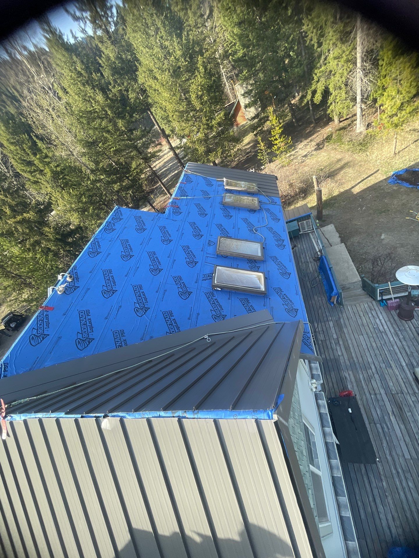 Shingle to Metal Roof Conversion by Top Notch Roofing Inc
