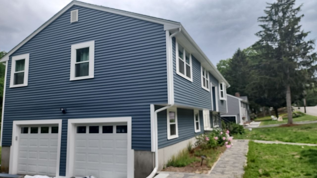 Siding and windows replaced by UBrothers Construction