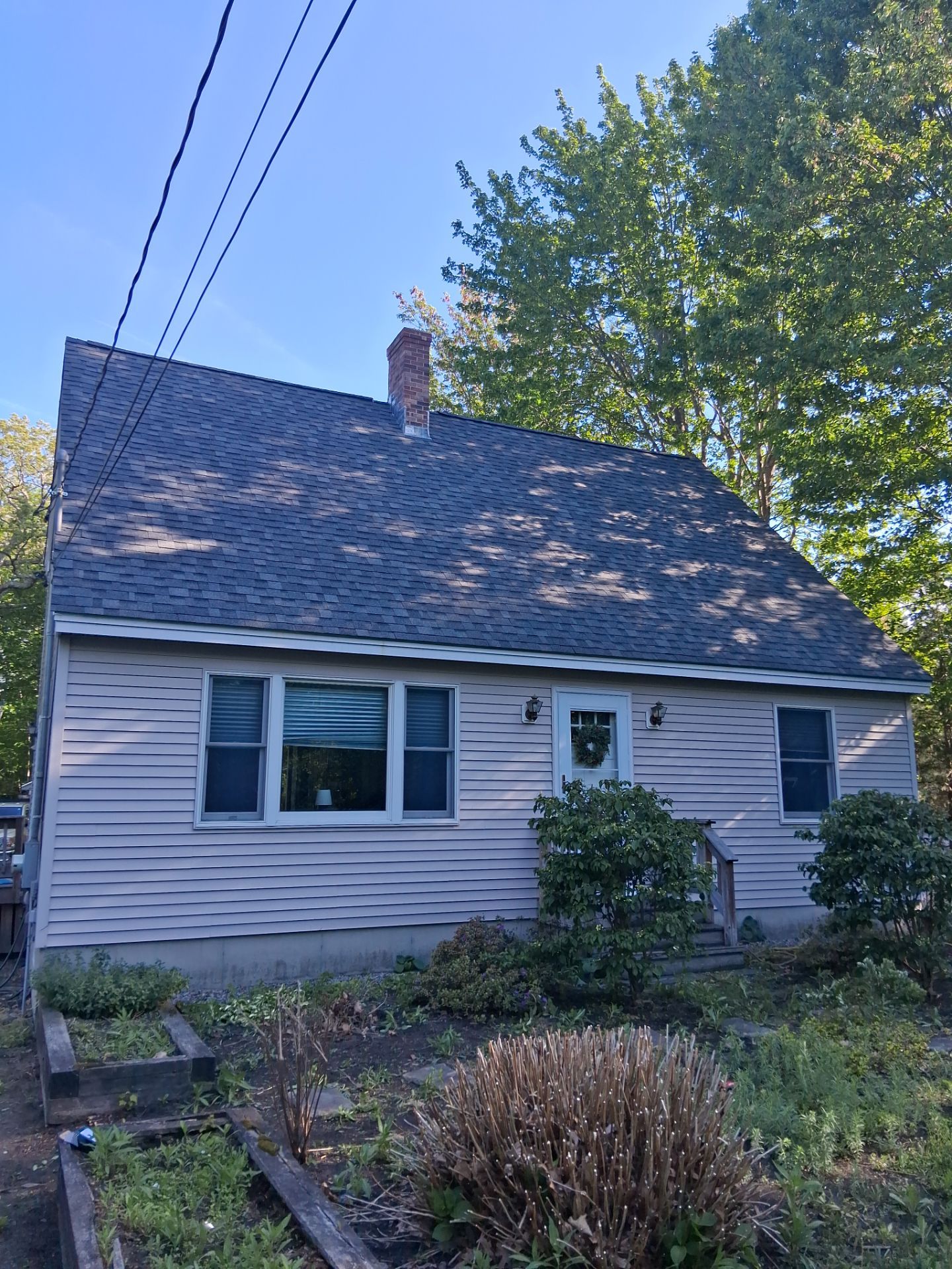 Complete Residential Roofing Installation and Chimney Reflash in Ogunquit by Tall pine roofing