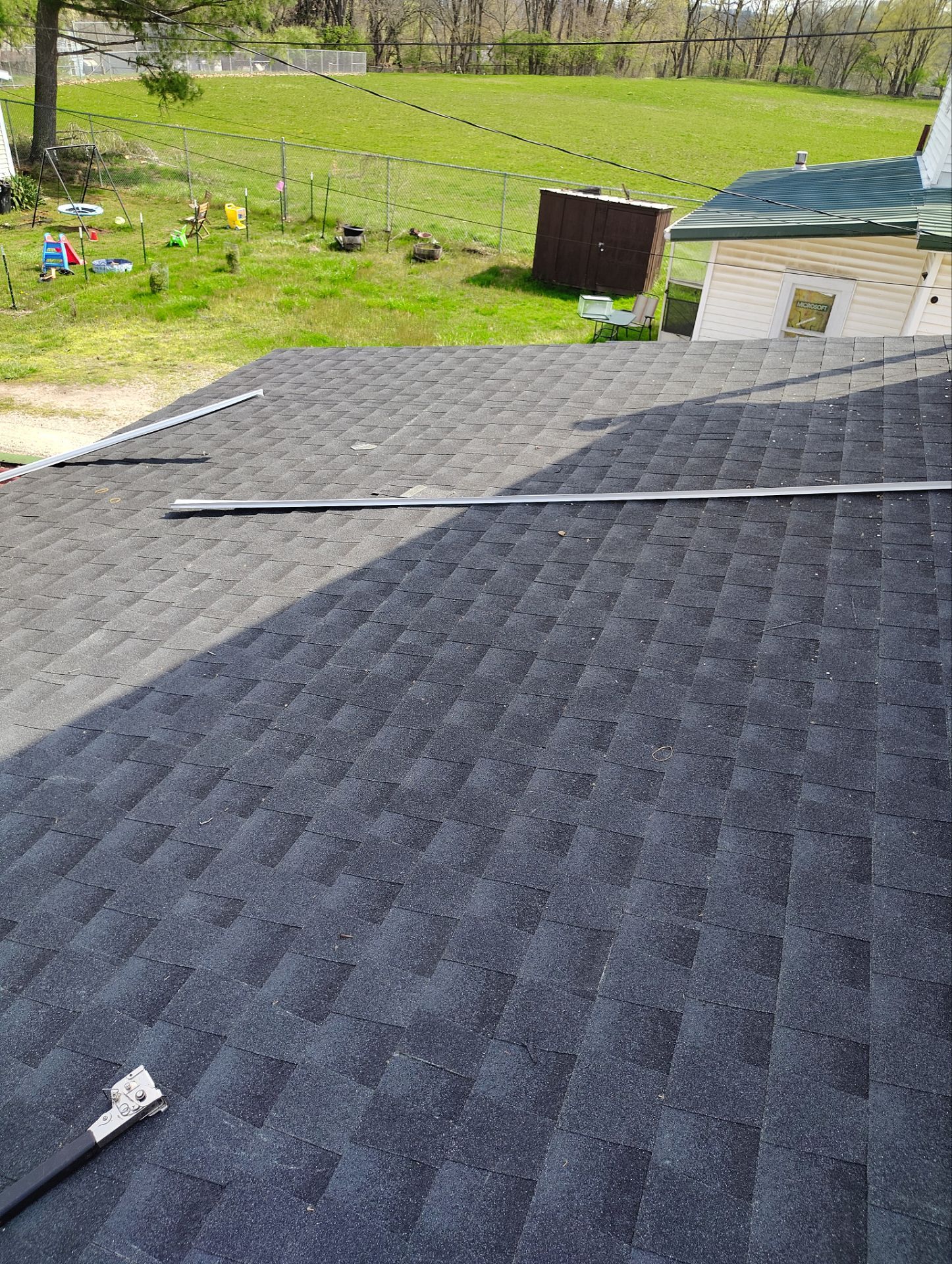 Residential Roofing Installation using GAF Timberline HDZ Charcoal by Rainstoppers Roofing