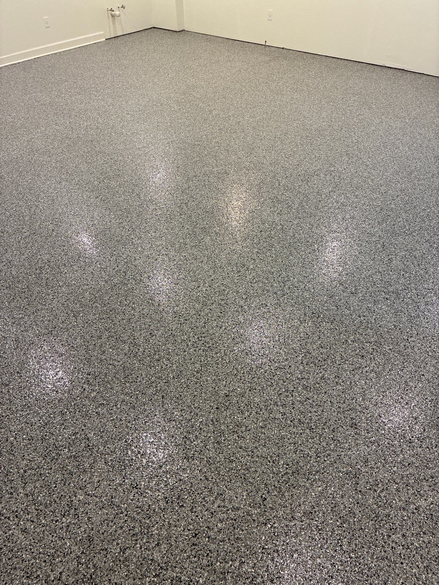 Keystone Flake Floor Coating in West Des Moines by Revival Concrete Coatings